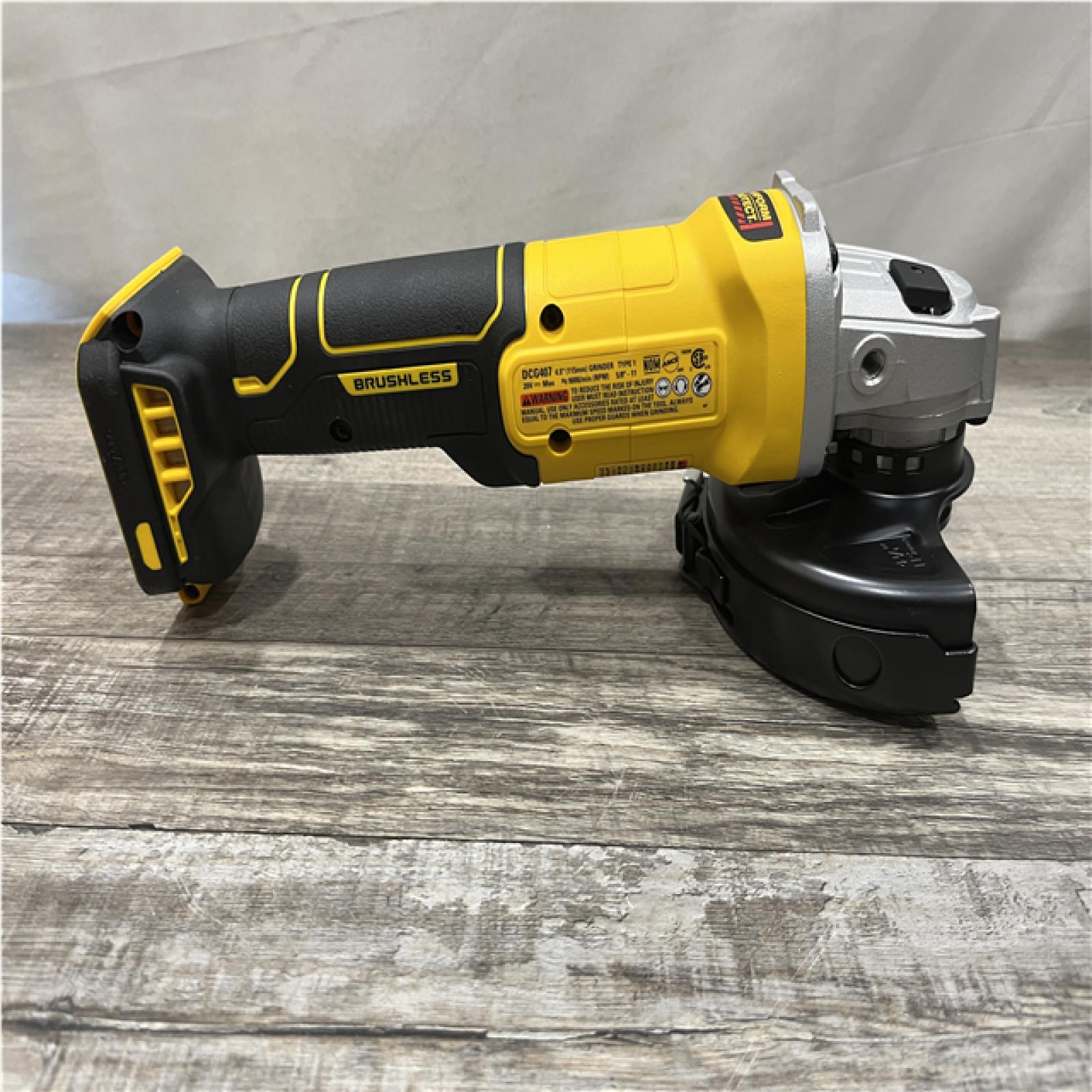 AS-IS DEWALT 20-Volt MAX Cordless Brushless 4-1/2 in. Angle Grinder with Slide Switch (Tool Only)