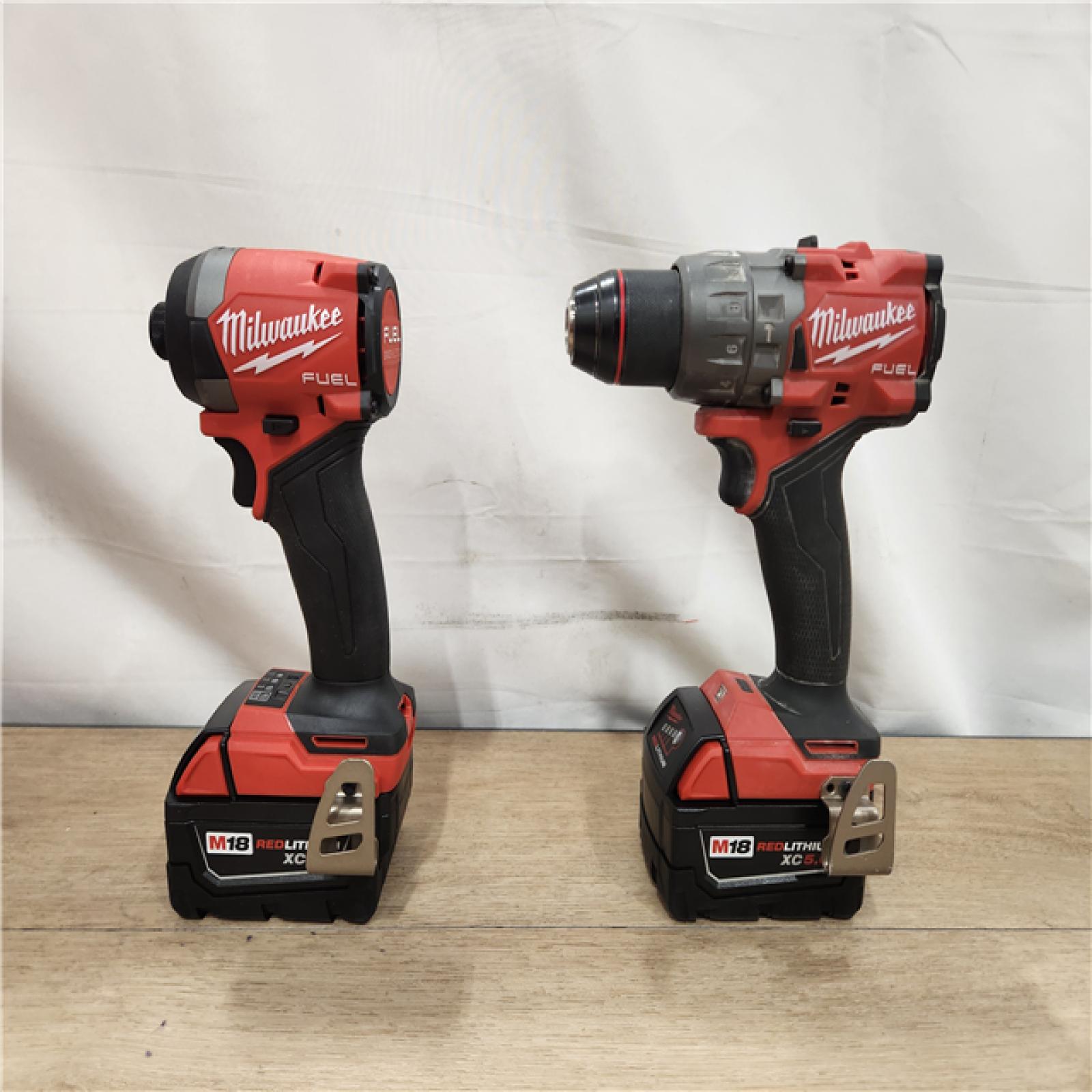 AS-IS- Milwaukee FUEL 18V Lithium-Ion Brushless Cordless Hammer Drill and Impact Driver Combo Kit