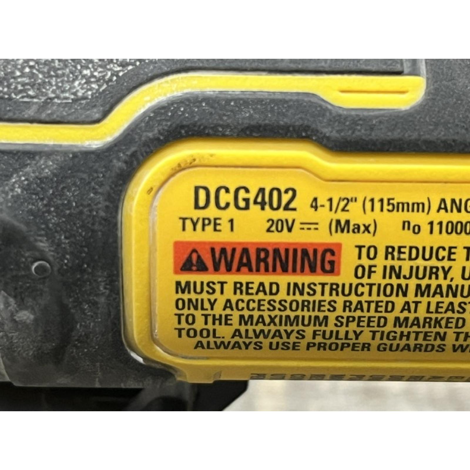 AS-IS DEWALT ATOMIC 20V MAX Cordless 4-1/2 in. Angle Grinder with Paddle Switch (Tool Only)
