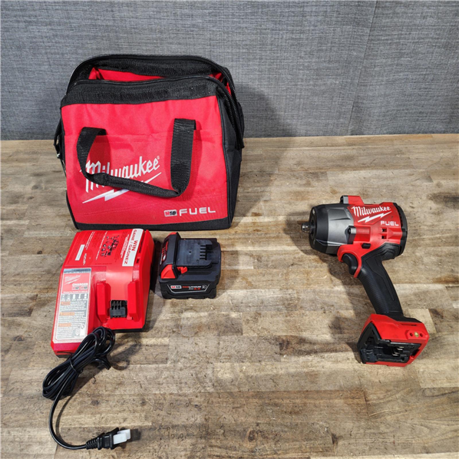 HOUSTON LOCATION - AS-IS Milwaukee M18 1/2 in. Cordless Brushless High Torque Impact Wrench Kit (Battery & Charger)