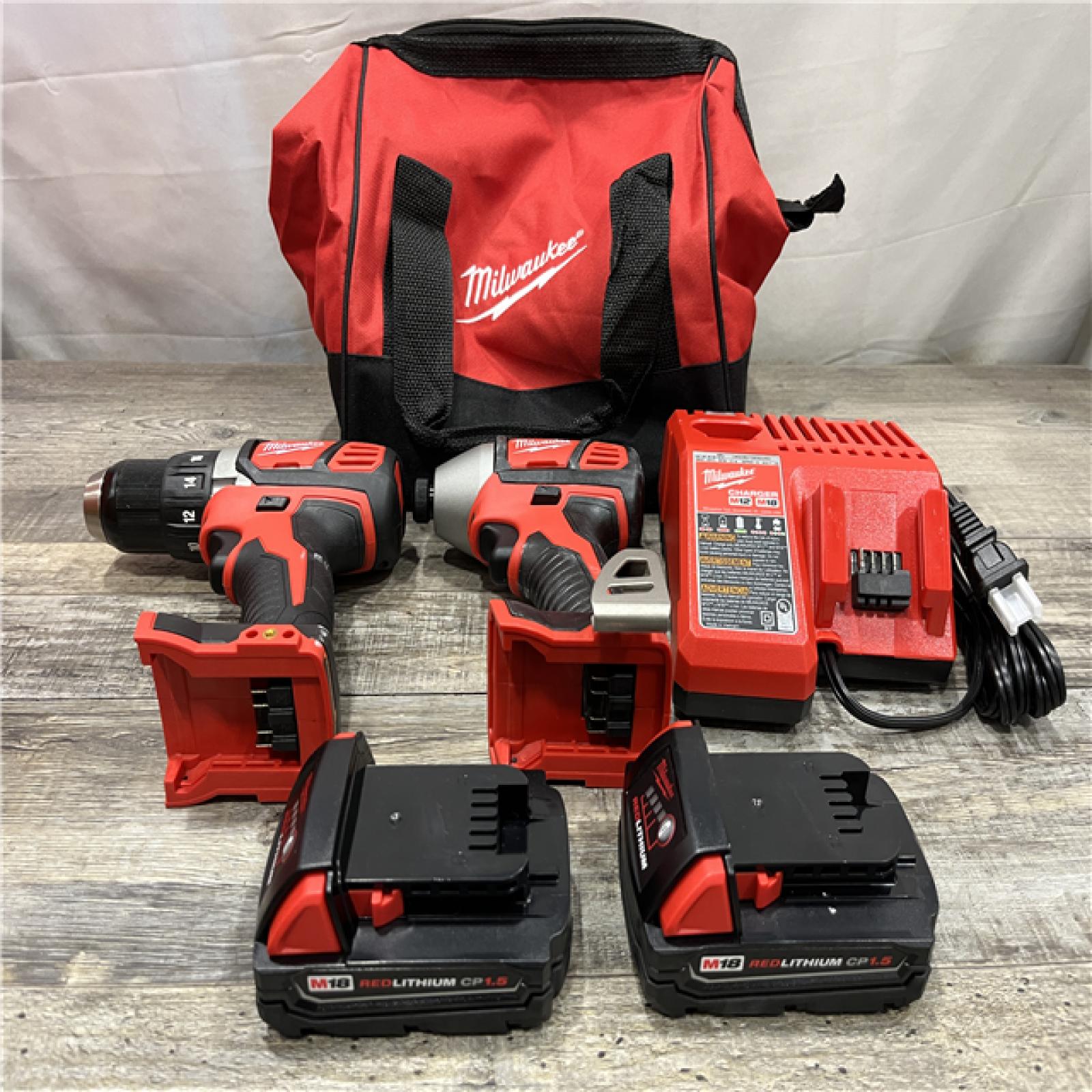 AS-IS Milwaukee 18V Lithium-Ion Cordless Drill Driver/Impact Driver Combo Kit