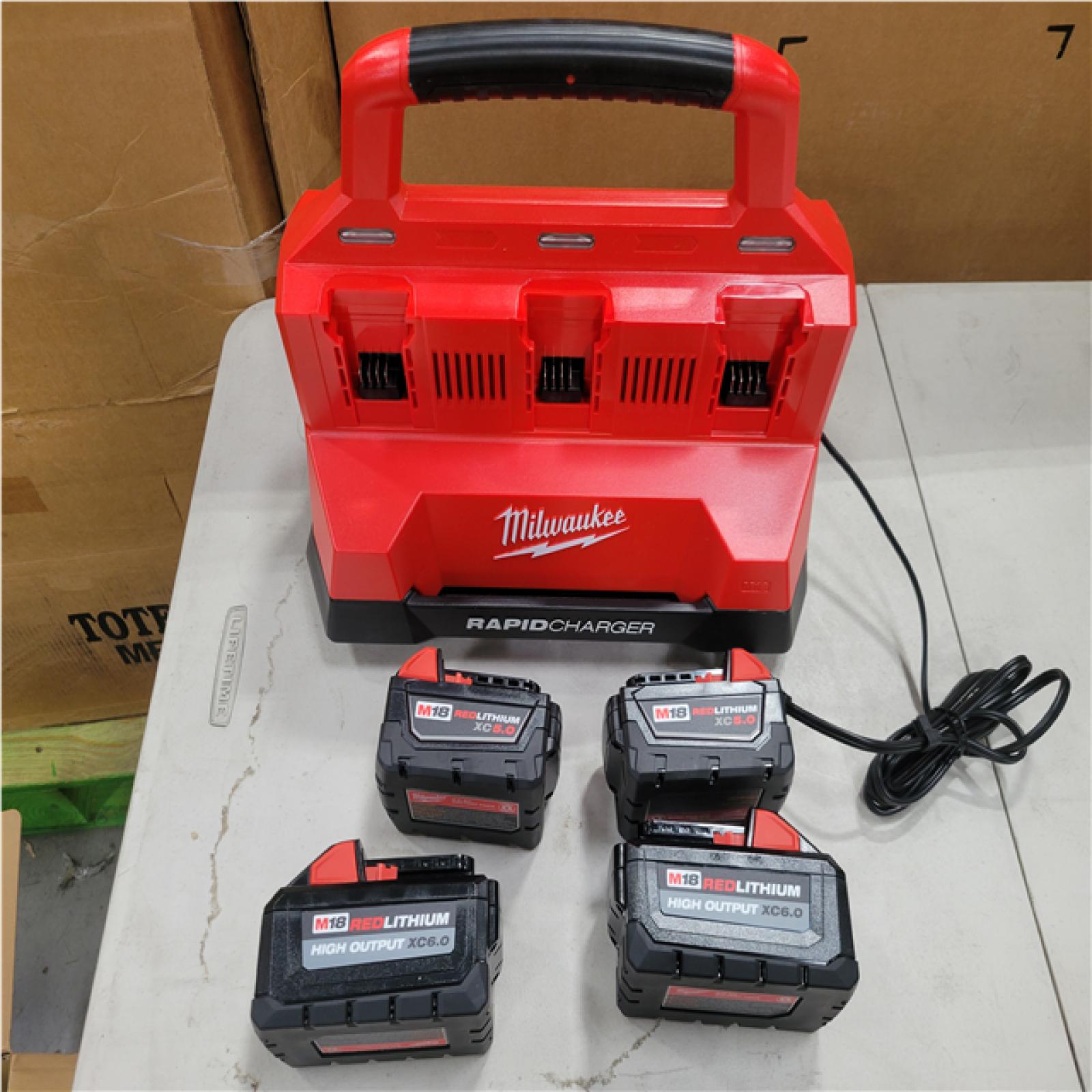 CALIFORNIA AS-IS MILWAUKEE 6-BAY RAPID CHARGER & 4PK BATTERY KIT