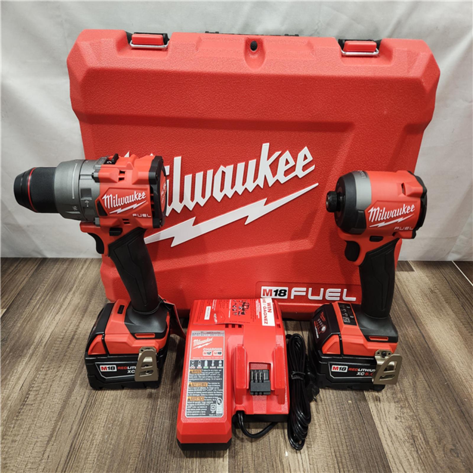 AS-IS- MILWAUKEE FUEL 18V Lithium-Ion Brushless Cordless Hammer Drill and Impact Driver Combo Kit
