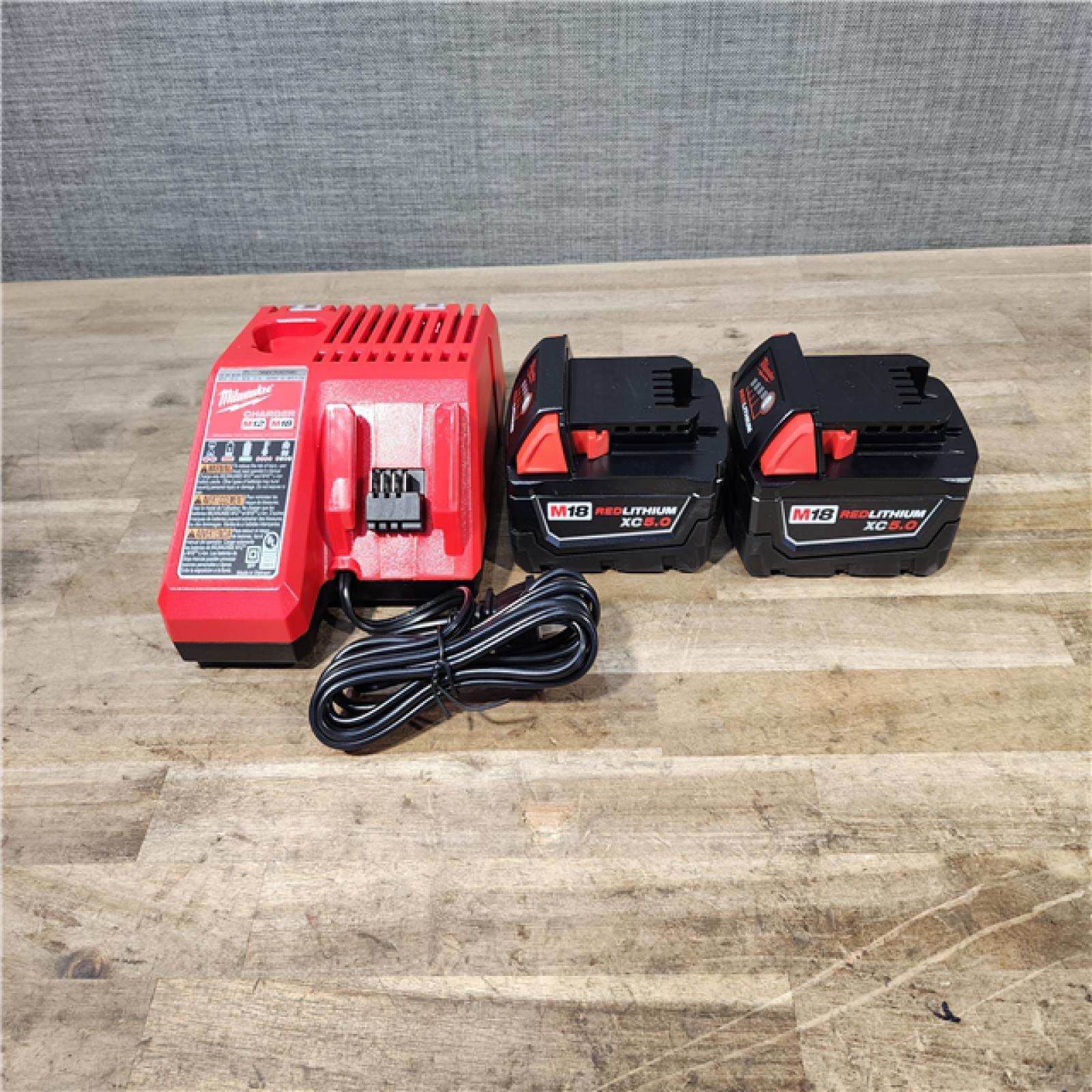 HOUSTON LOCATION - AS-IS (APPEARS LIKE NEW) Milwaukee M18 FUEL 18V Lithium-Ion Brushless Cordless Hammer Drill and Impact Driver Combo Kit