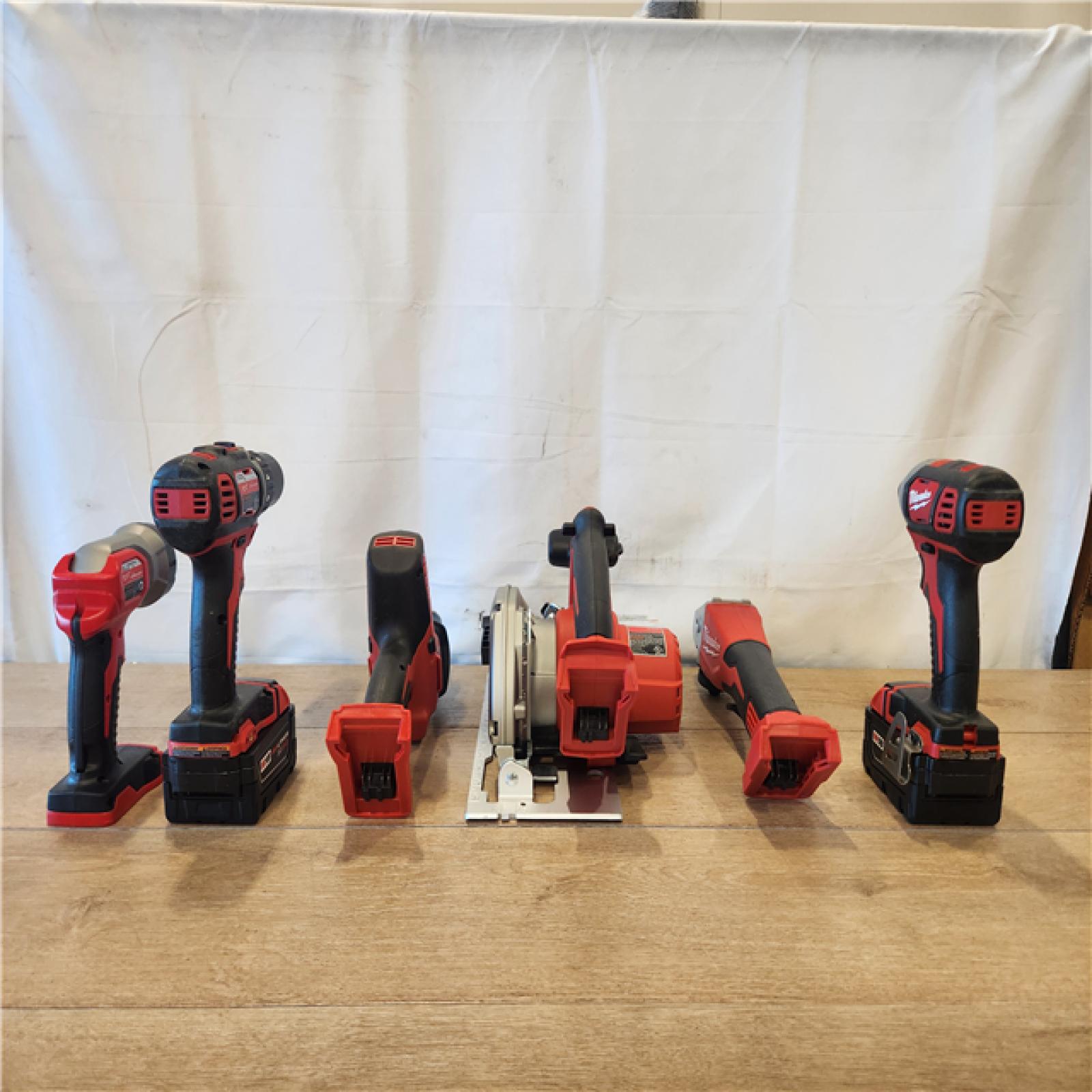 AS-IS- M18 18-Volt Lithium-Ion Cordless Combo Kit 7-Tool with 2-Batteries  Charger and Tool Bag