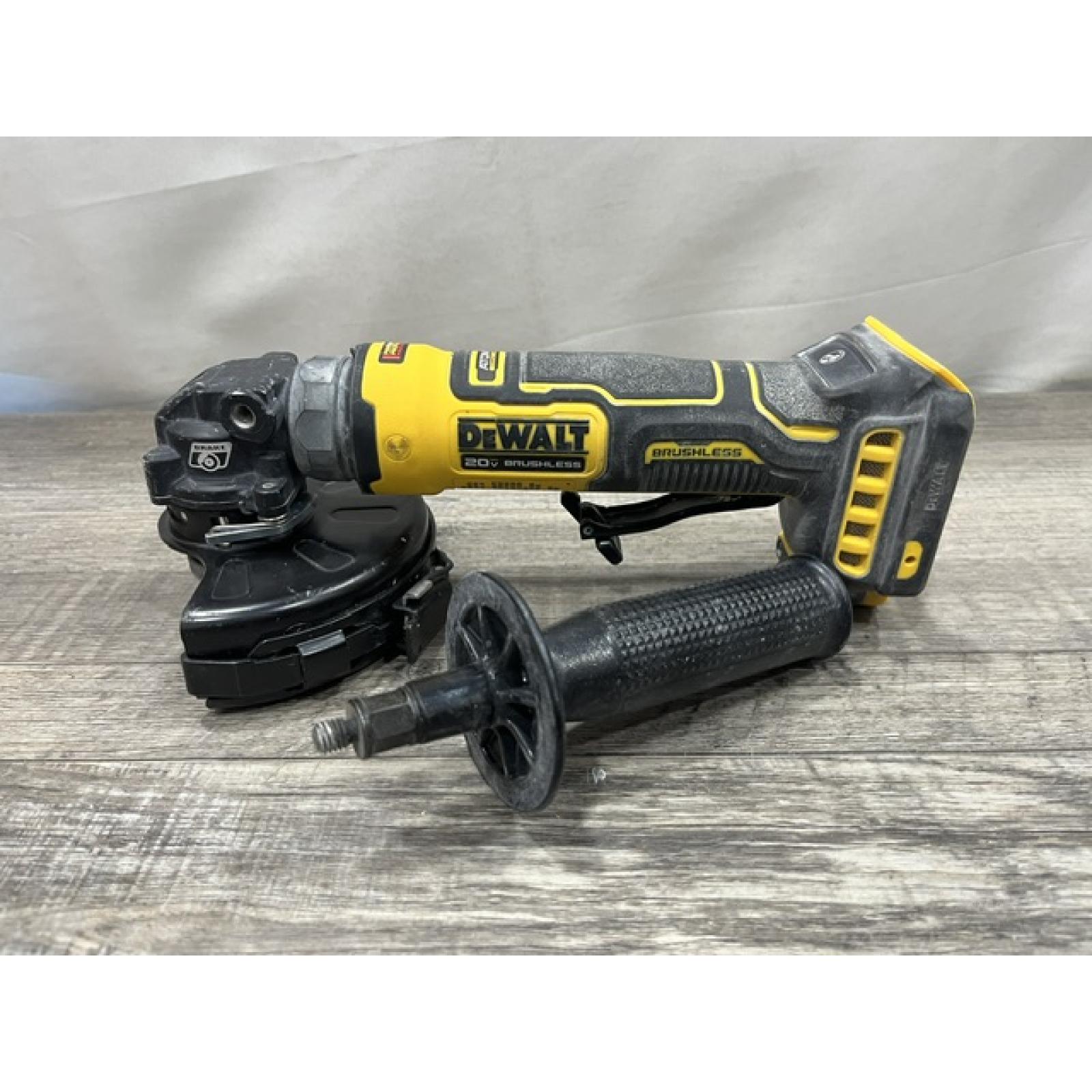 AS-IS DEWALT ATOMIC 20V MAX Cordless 4-1/2 in. Angle Grinder with Paddle Switch (Tool Only)