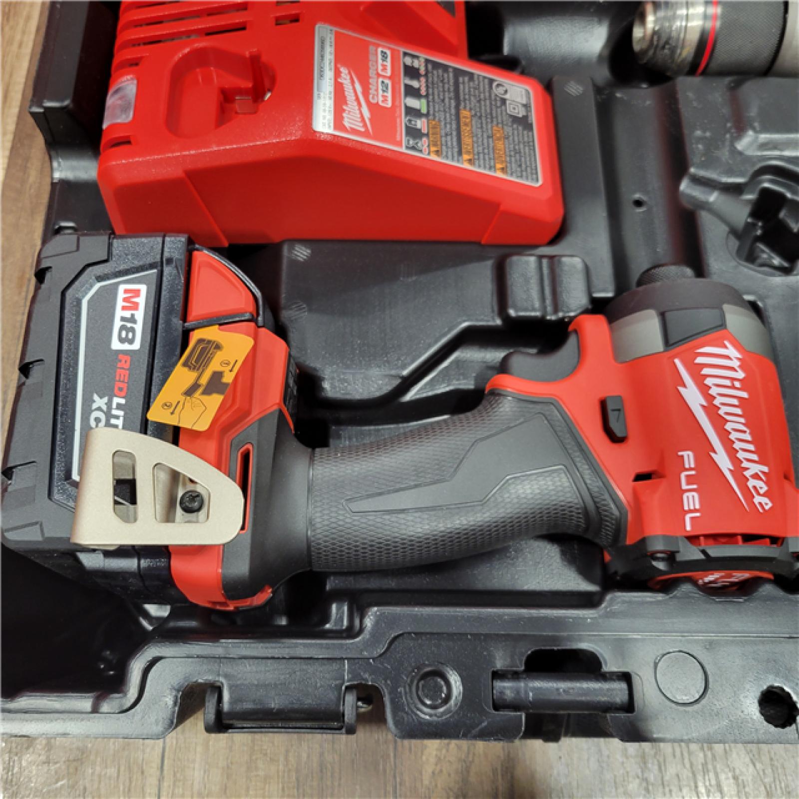 AS-IS  MILWAUKEE M18 FUEL 18V Lithium-Ion Brushless Cordless Hammer Drill and Impact Driver Combo Kit (2-Tool) with 2 Batteries