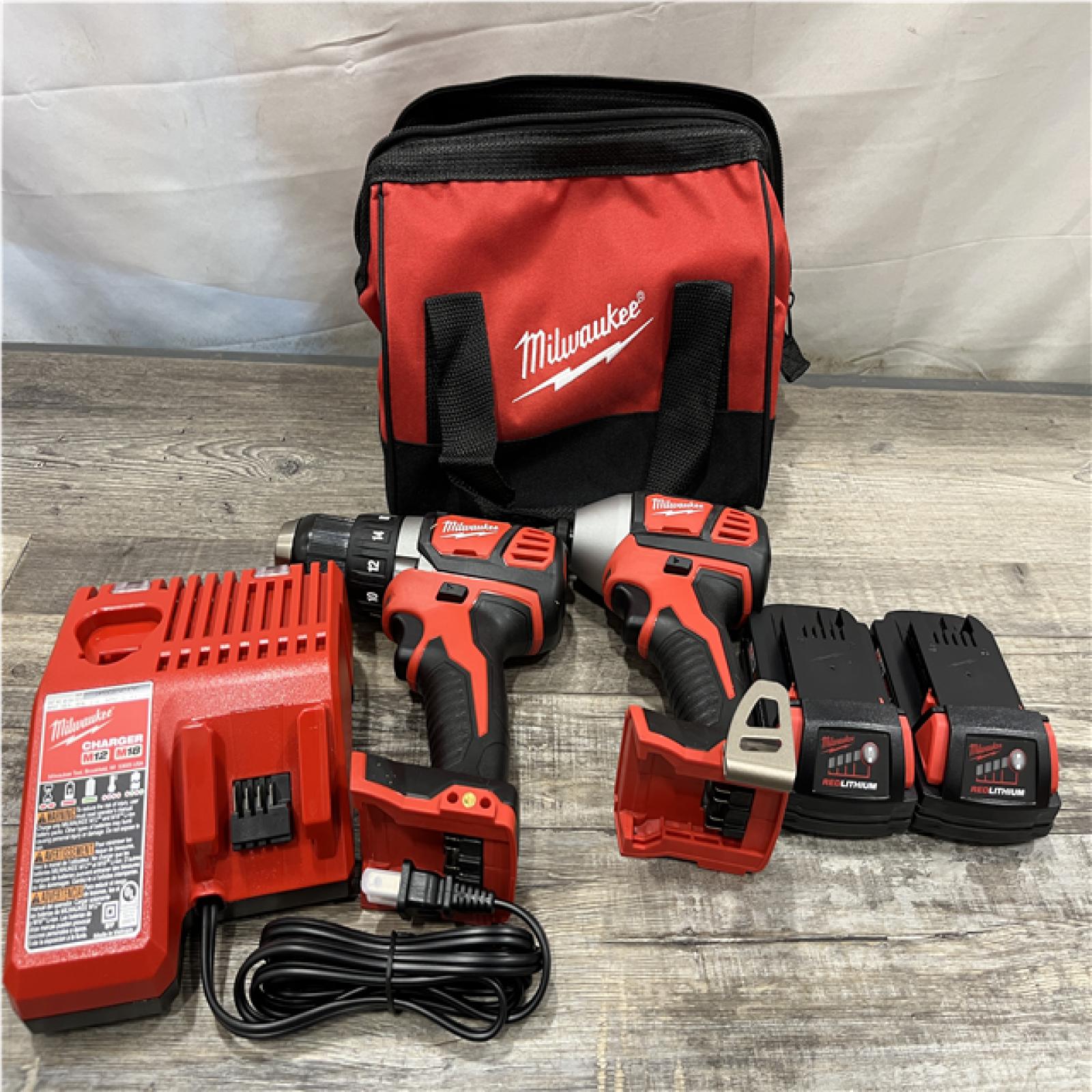 AS-IS Milwaukee 18V Lithium-Ion Cordless Drill Driver/Impact Driver Combo Kit