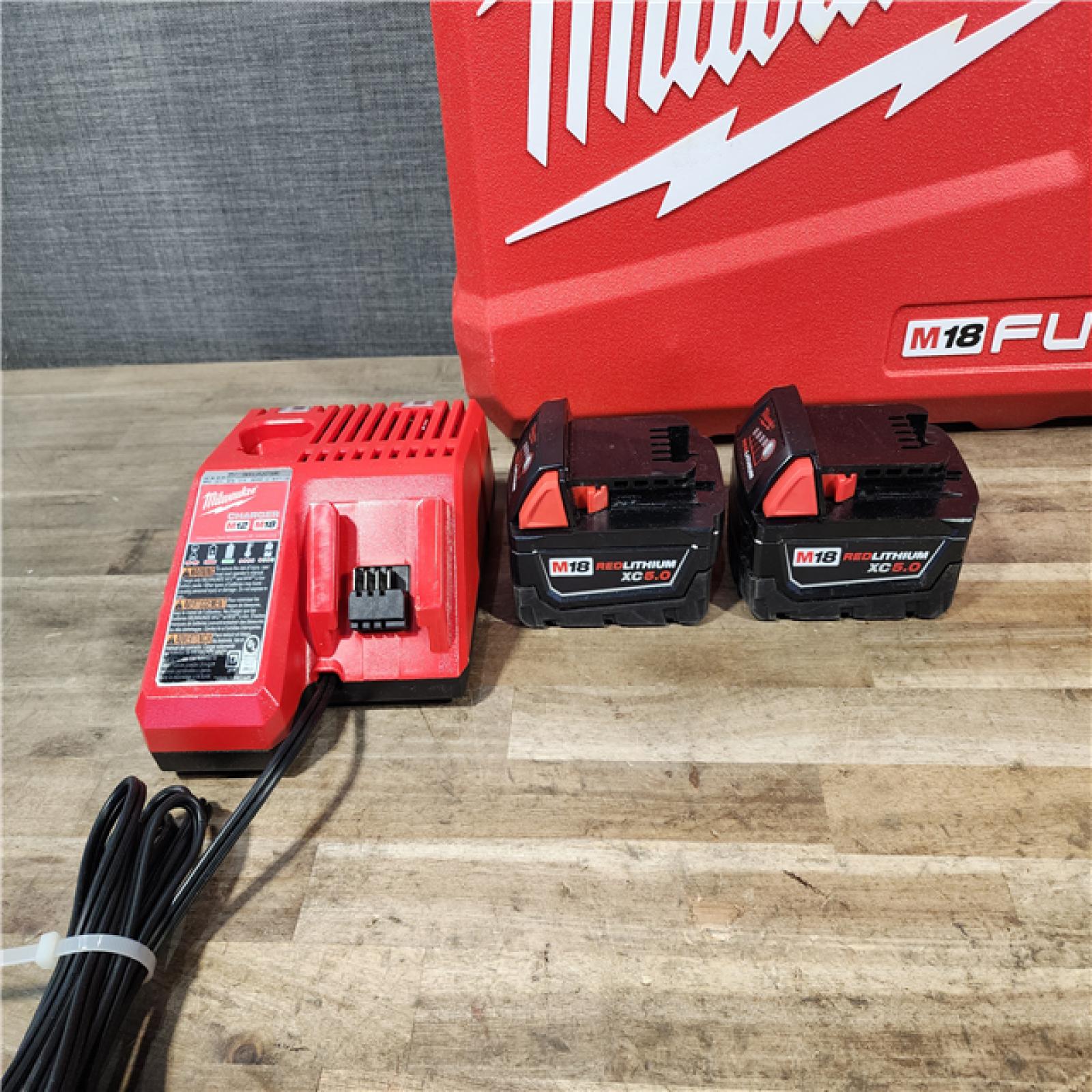 HOUSTON LOCATION - AS-IS Milwaukee FUEL 18V Lithium-Ion Brushless Cordless Hammer Drill and Impact Driver Combo Kit