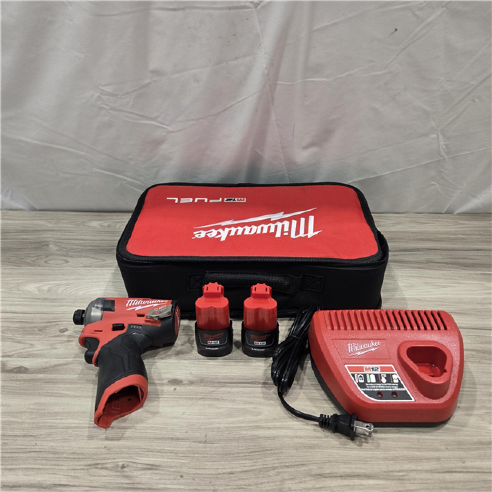 AS-IS Milwaukee M12 FUEL SURGE 12V Cordless 1/4 in. Hex Impact Driver Compact Kit