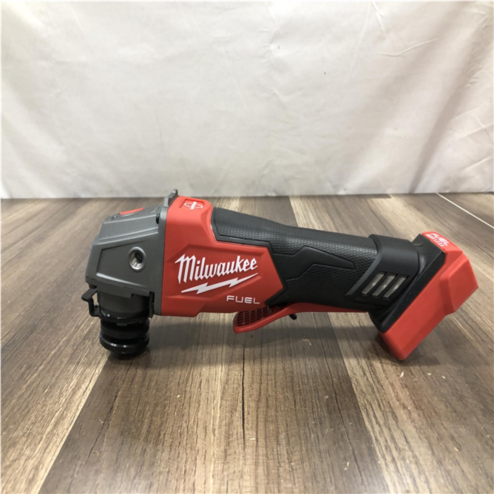 AS-IS Milwaukee FUEL 18V Lithium-Ion Brushless Cordless 4-1/2 in./5 in. Grinder w/Paddle Switch (Tool-Only)