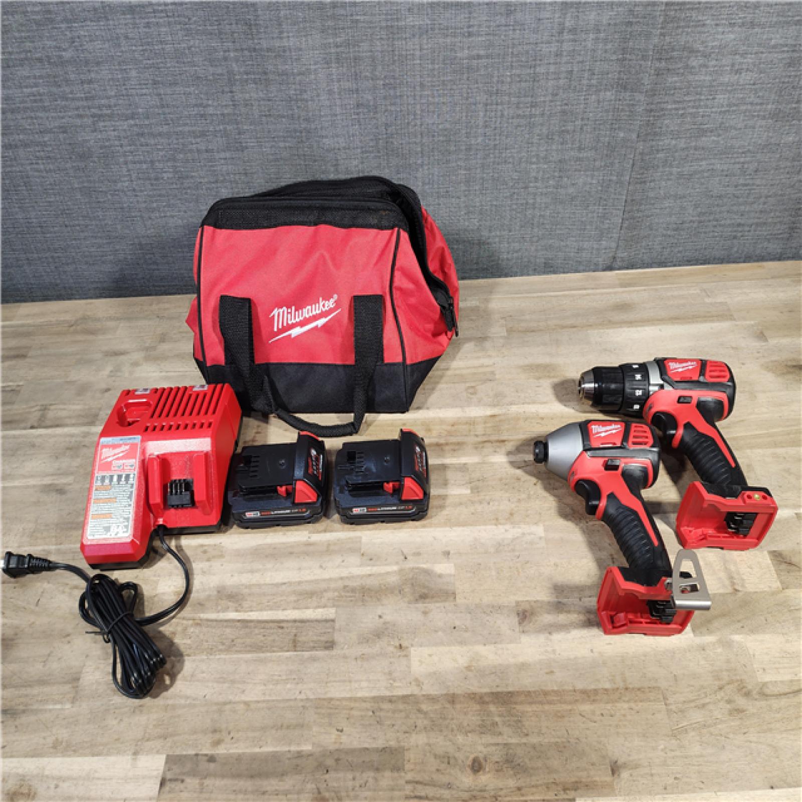 HOUSTON LOCATION - AS-IS Milwaukee 18V Cordless Brushed 2-Tool Drill/Driver and Impact Driver Kit