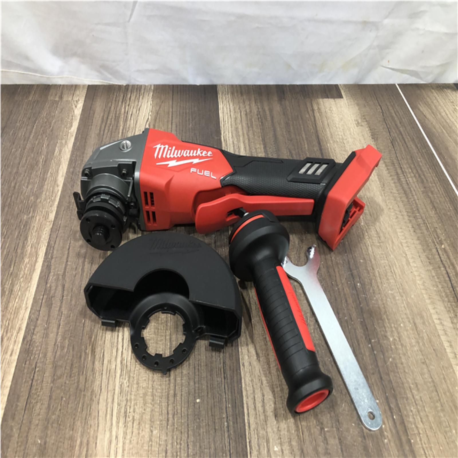 AS-IS Milwaukee FUEL 18V Lithium-Ion Brushless Cordless 4-1/2 in./5 in. Grinder with Variable Speed & Paddle Switch (Tool-Only)