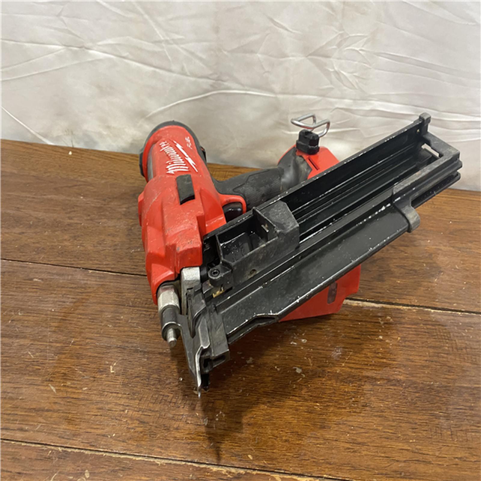 AS-IS Milwaukee 2744-20 M18 FUEL 3-1/2 in. 18-Volt 21-Degree Lithium-Ion Brushless Cordless Framing Nailer (Tool-Only)