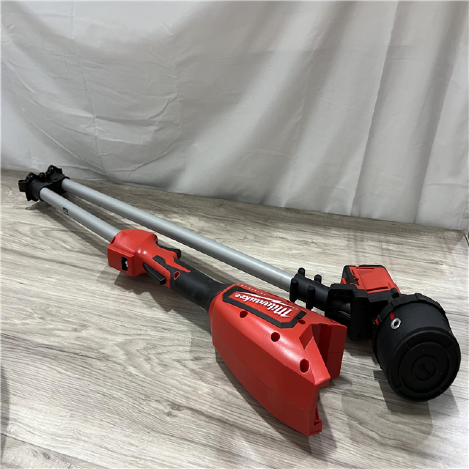 AS-IS Milwaukee Brushless 18V 16 in. Cordless Battery Powered String Trimmer Kit