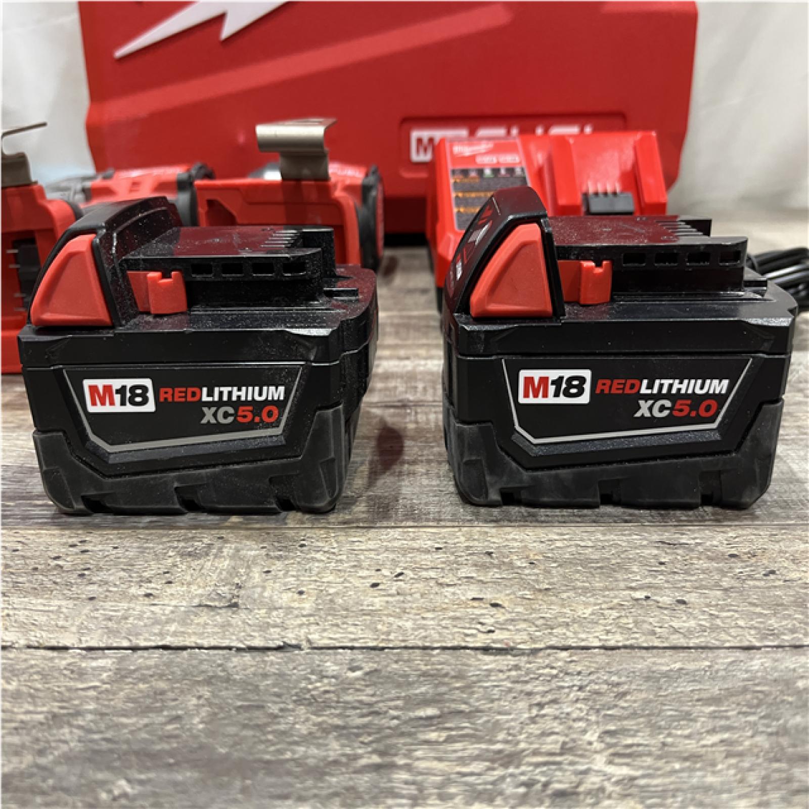AS-IS Milwaukee FUEL 18V Lithium-Ion Brushless Cordless Hammer Drill and Impact Driver Combo Kit