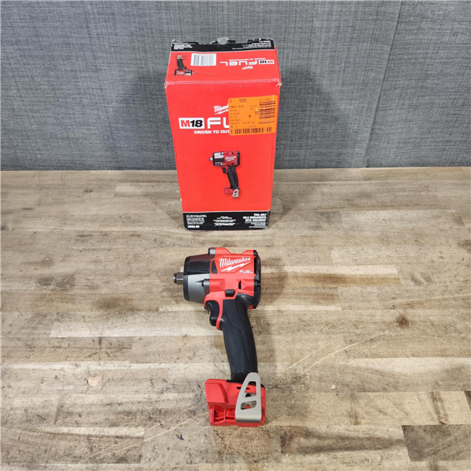 HOUSTON LOCATION - AS-IS (APPEARS LIKE NEW) Milwaukee 2962-20  M18 18V Fuel 1/2 Mid-Torque Impact Wrench Cordless Lithium-Ion Brushless (Tool-Only)