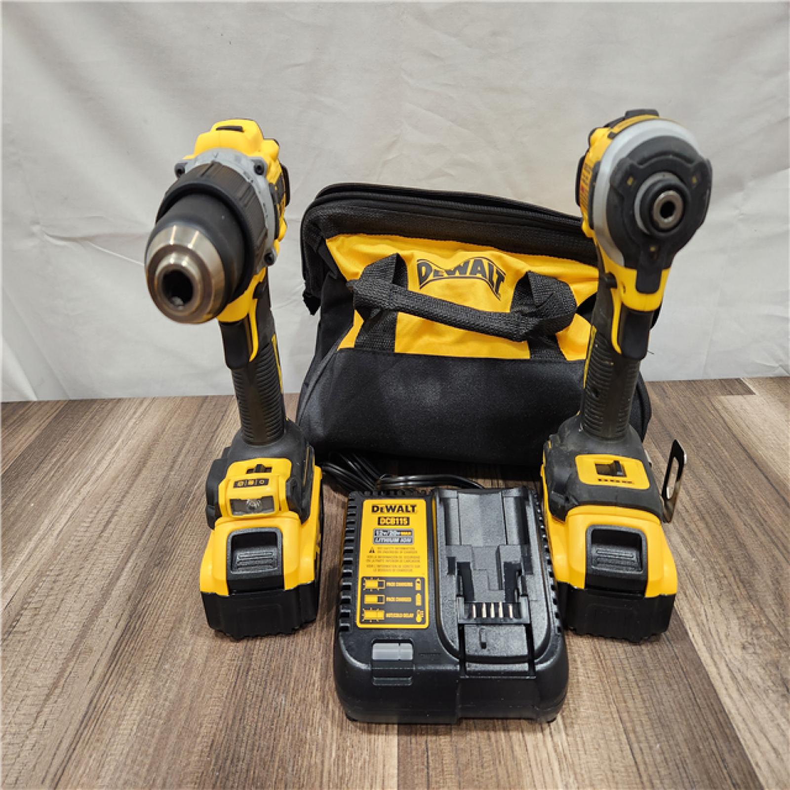AS-IS DEWALT 20V MAX XR Hammer Drill and ATOMIC Impact Driver 2 Tool Cordless Combo Kit with (2) 4.0Ah Batteries, Charger, and Bag