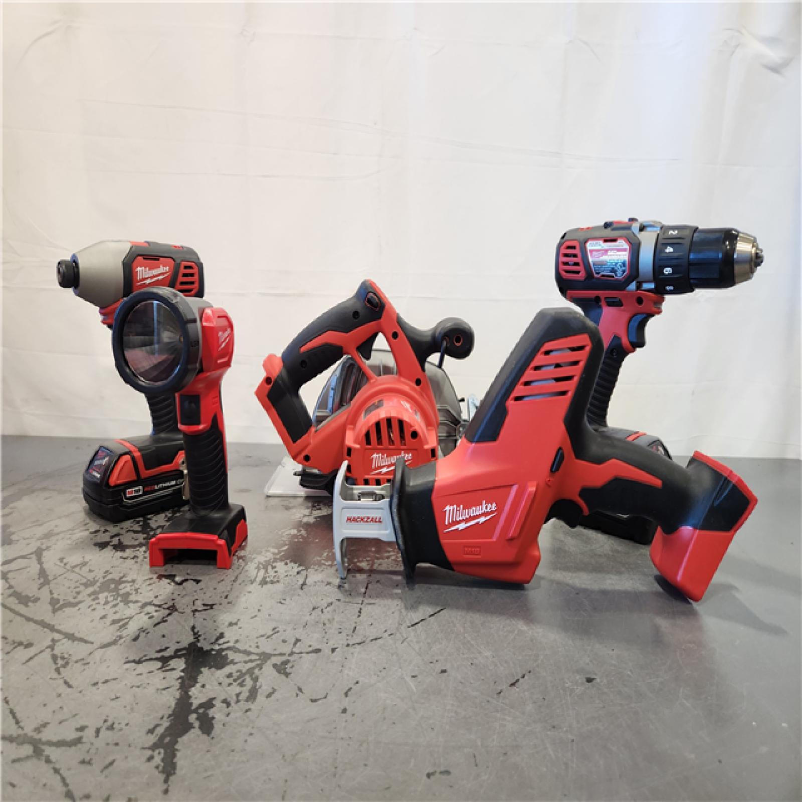 AS-IS- Milwaukee 18V Lithium-Ion Cordless Combo Kit (5-Tool) with (1) 3.0Ah and (1) 1.5Ah Battery, (1) Charger, (1) Tool Bag