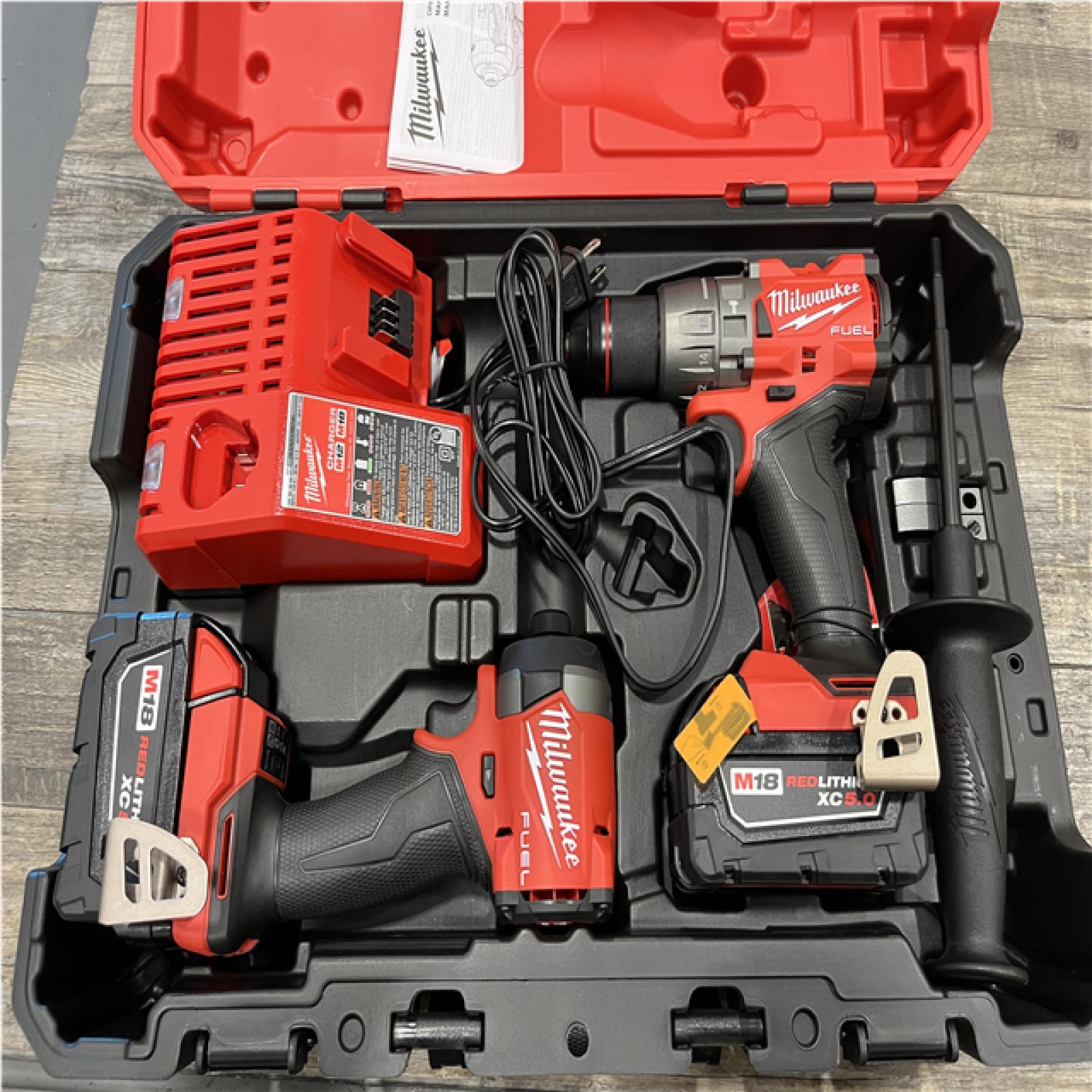 NEW - Milwaukee FUEL 18V Lithium-Ion Brushless Cordless Hammer Drill and Impact Driver Combo Kit