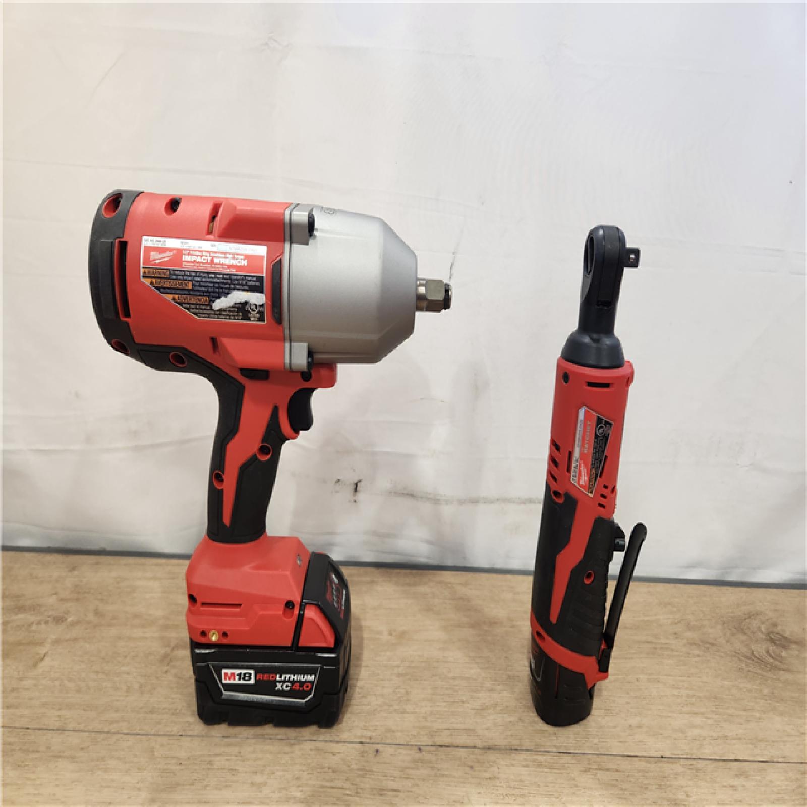 AS-IS- Milwaukee 12/18V Lithium-Ion Cordless 3/8 in. Ratchet and 1/2 in. High Torque Impact Wrench with Friction Ring Combo Kit