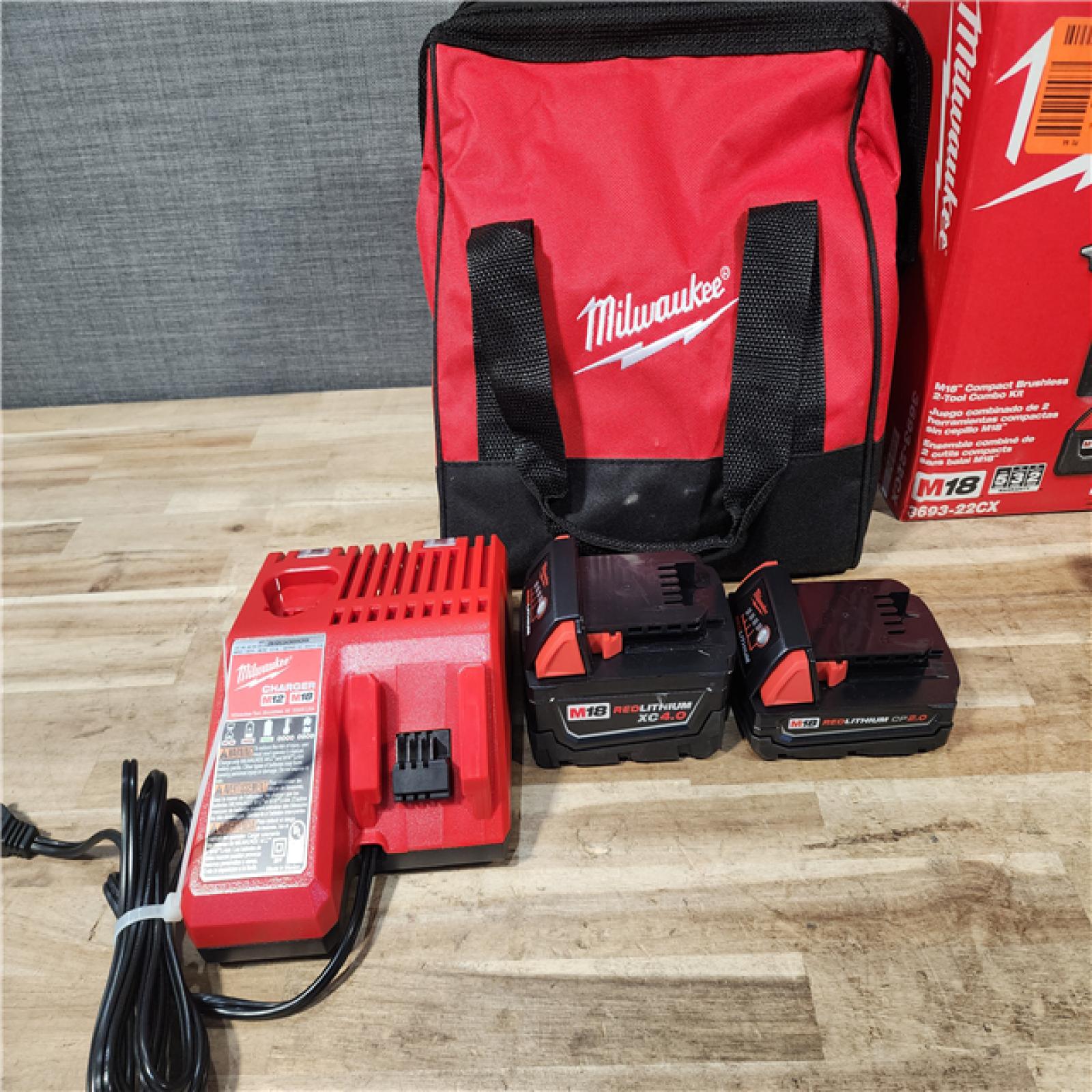 HOUSTON LOCATION - AS-IS Milwaukee 18-Volt Lithium-Ion Brushless Cordless Compact Hammer Drill/Impact Combo Kit