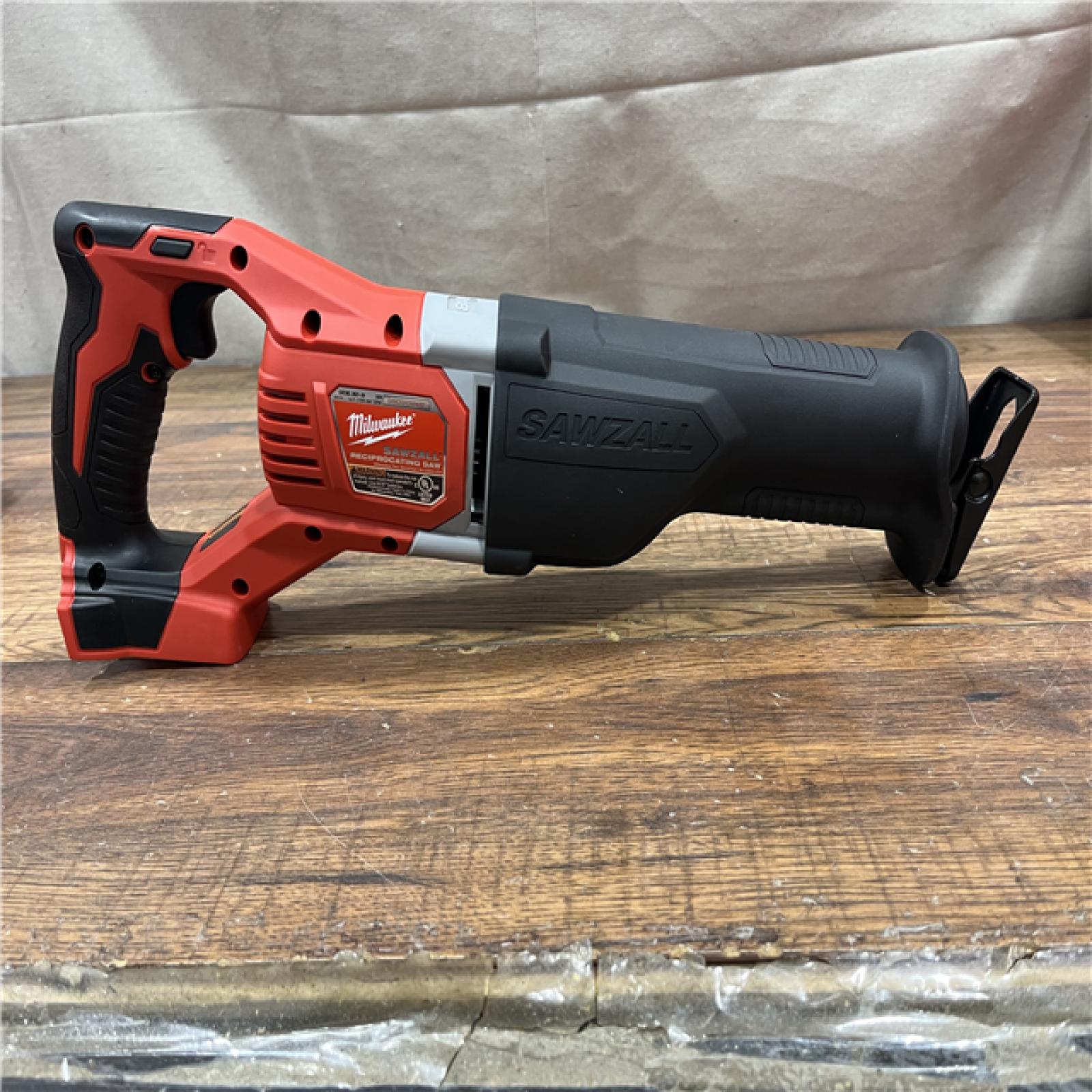 AS-IS MILWAUKEE M18 18V Lithium-Ion Cordless Combo Tool Kit with Two 3.0Ah Batteries, 1-Charger, 1-Tool Bag (4-Tool)
