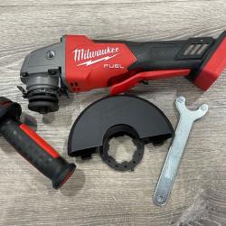 AS-IS Milwaukee FUEL 18V Lithium-Ion Brushless Cordless 4-1/2 in./5 in. Grinder w/Paddle Switch (Tool-Only)