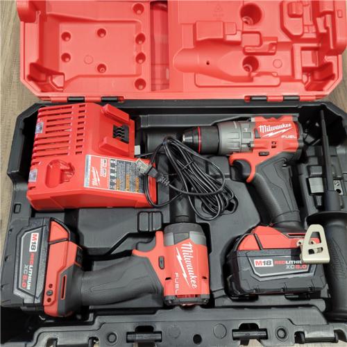 AS-IS MILWAUKEE   M18 FUEL 18V Lithium-Ion Brushless Cordless Hammer Drill and Impact Driver Combo Kit (2-Tool) with 2 Batteries