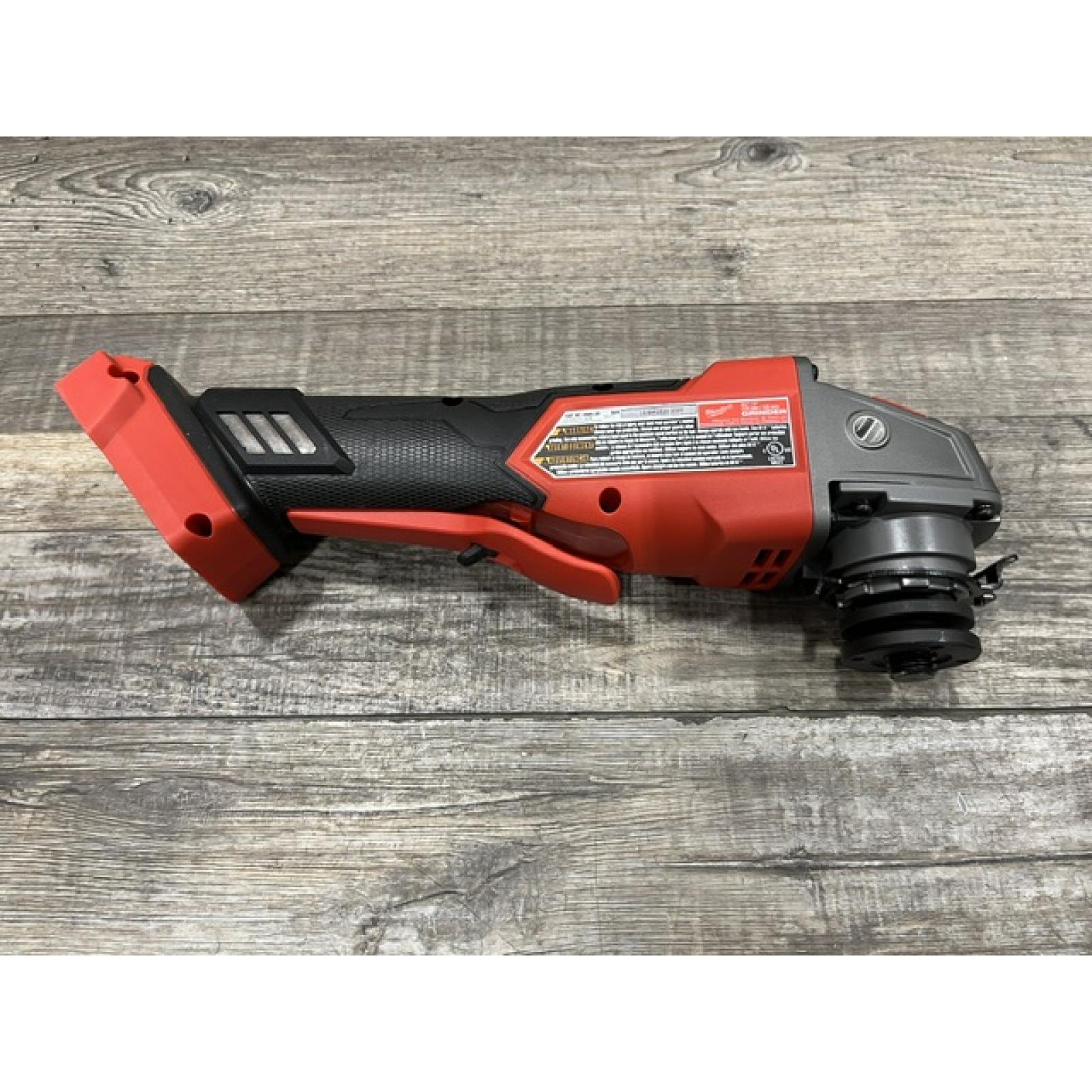 AS-IS Milwaukee FUEL 18V Lithium-Ion Brushless Cordless 4-1/2 in./5 in. Grinder w/Paddle Switch (Tool-Only)