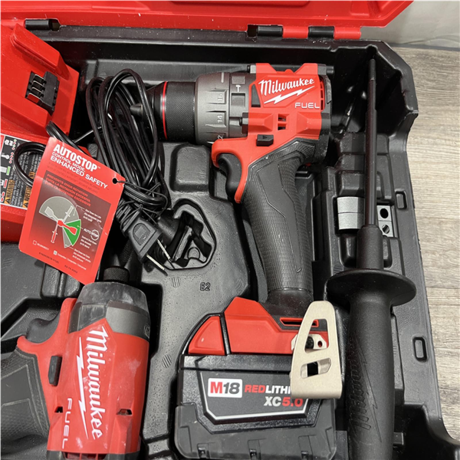 AS-IS Milwaukee FUEL 18V Lithium-Ion Brushless Cordless Hammer Drill and Impact Driver Combo Kit