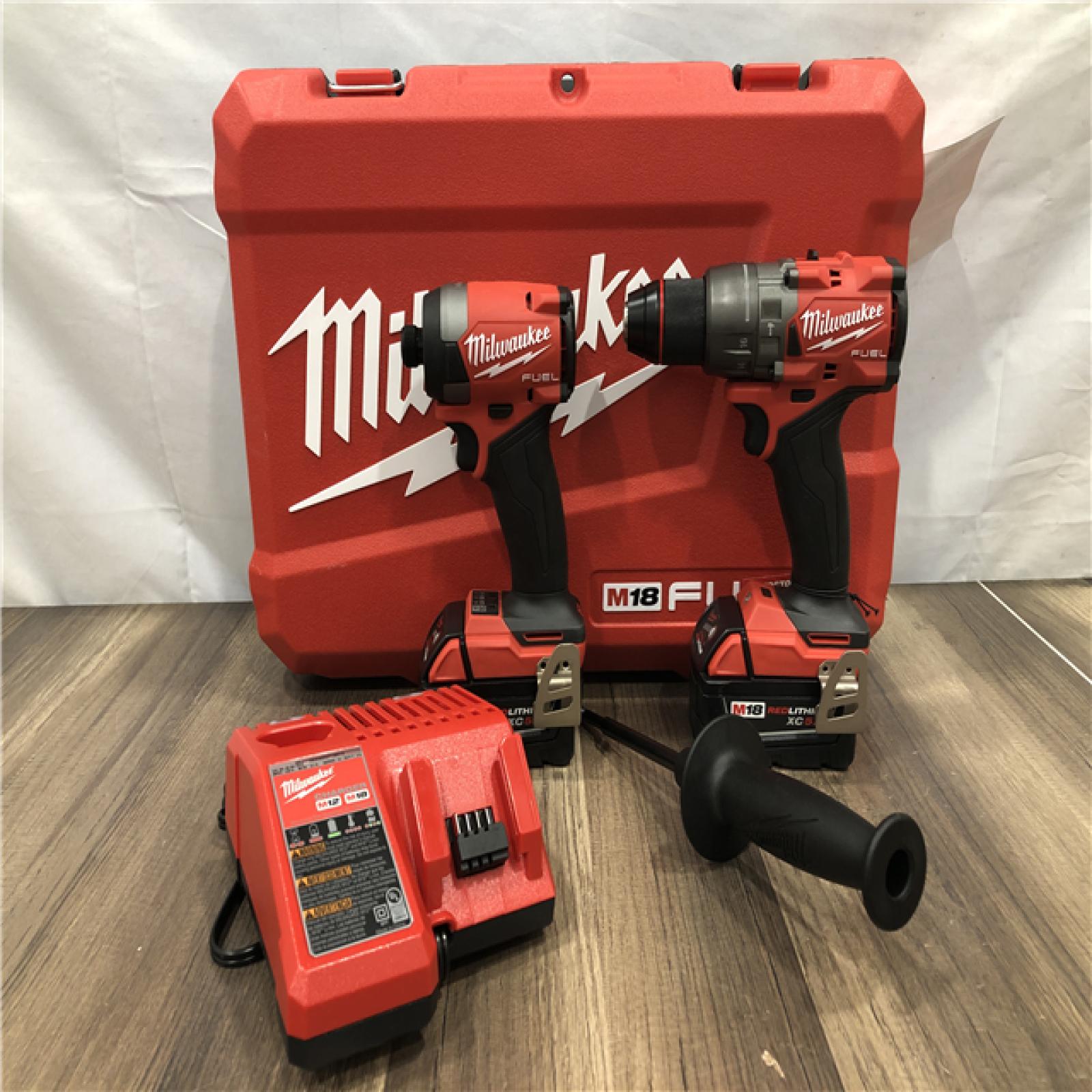 AS-IS Milwaukee FUEL 18V Lithium-Ion Brushless Cordless Hammer Drill and Impact Driver Combo Kit