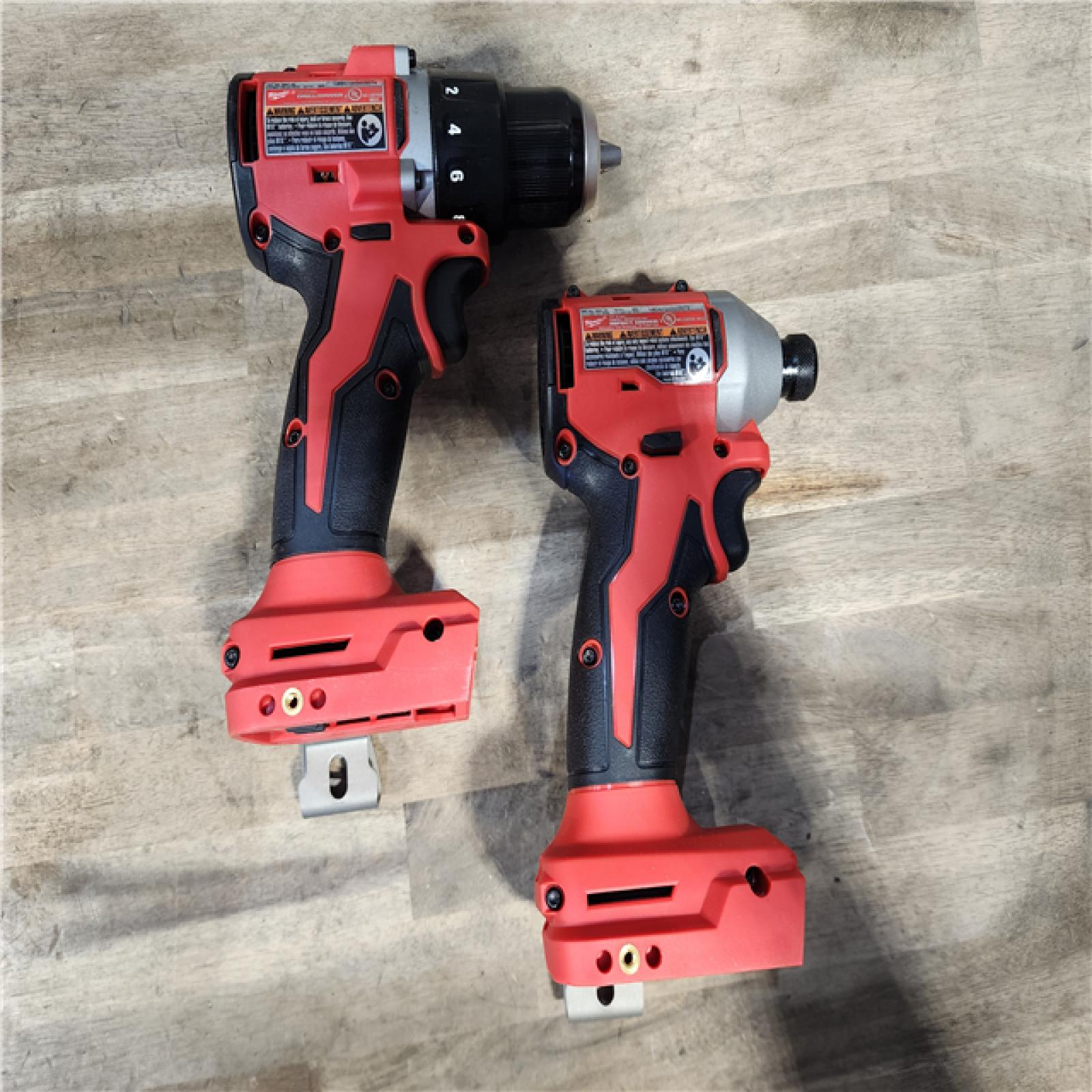 HOUSTON LOCATION - AS-IS Milwaukee M18 18V Lithium-Ion Brushless Cordless Compact Drill/Impact Combo Kit (2-Tool) W/(2) 2.0 Ah Batteries  Charger & Bag
