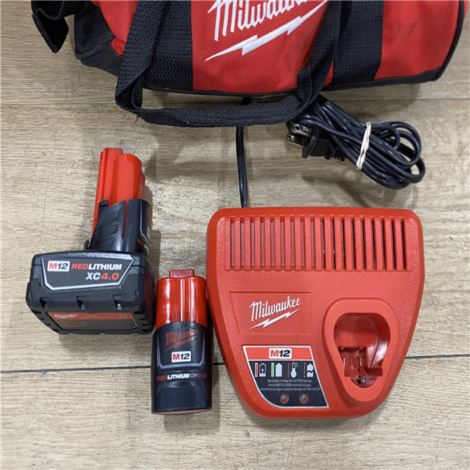 AS-IS Milwaukee FUEL 12-Volt Lithium-Ion Brushless Cordless Hammer Drill and Impact Driver Combo Kit