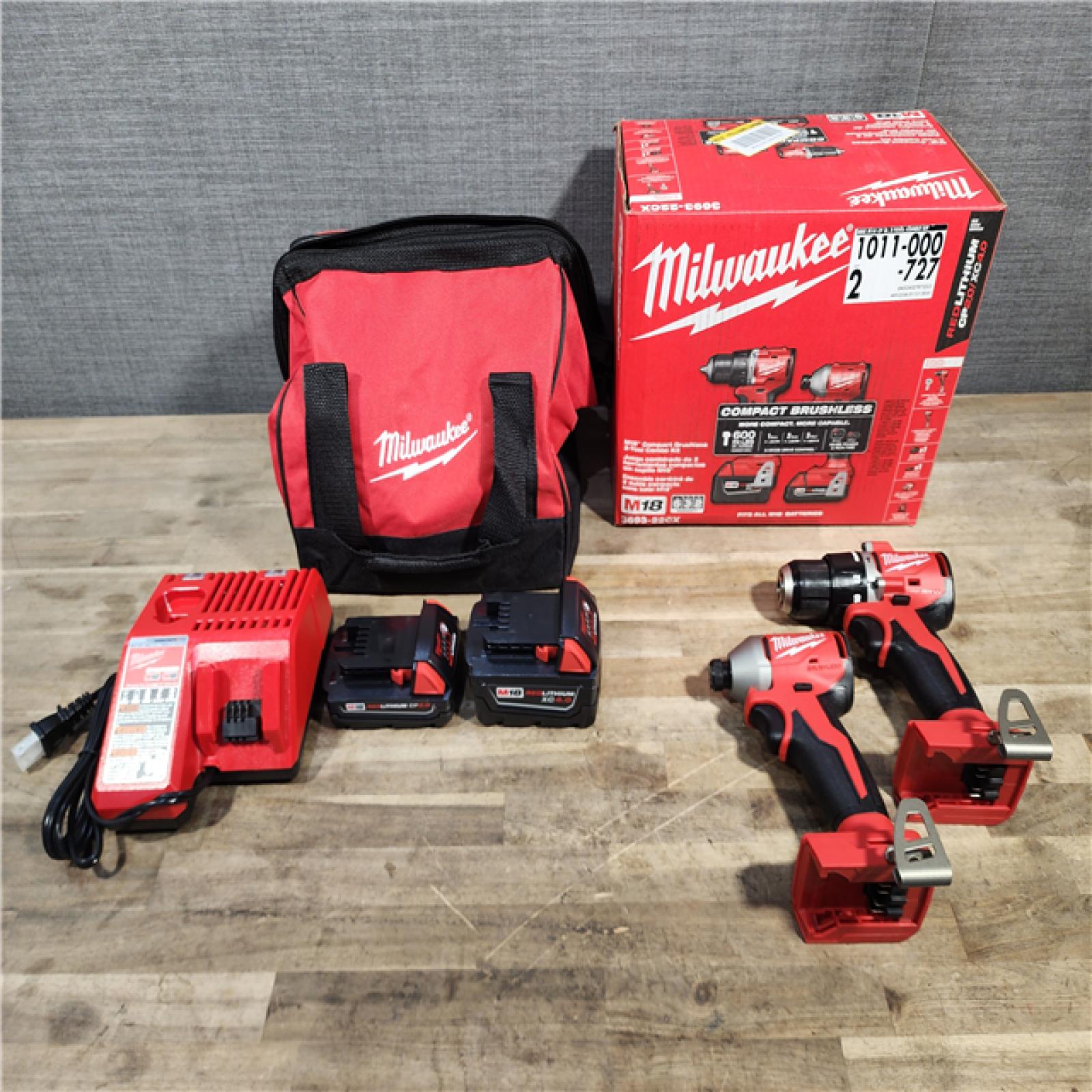 HOUSTON LOCATION - AS-IS M18 18-Volt Lithium-Ion Brushless Cordless Compact Hammer Drill/Impact Combo Kit (2-Tool) with (2) Batteries, Bag