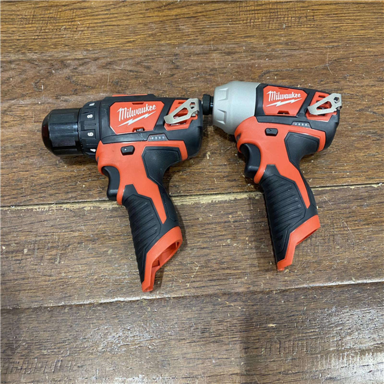AS-IS Milwaukee 2494-22 M12 Cordless Combination 3/8  Drill / Driver and 1/4  Hex Impact Driver Dual Power Tool Kit (2 Lithium Ion Batteries  Charger  and B