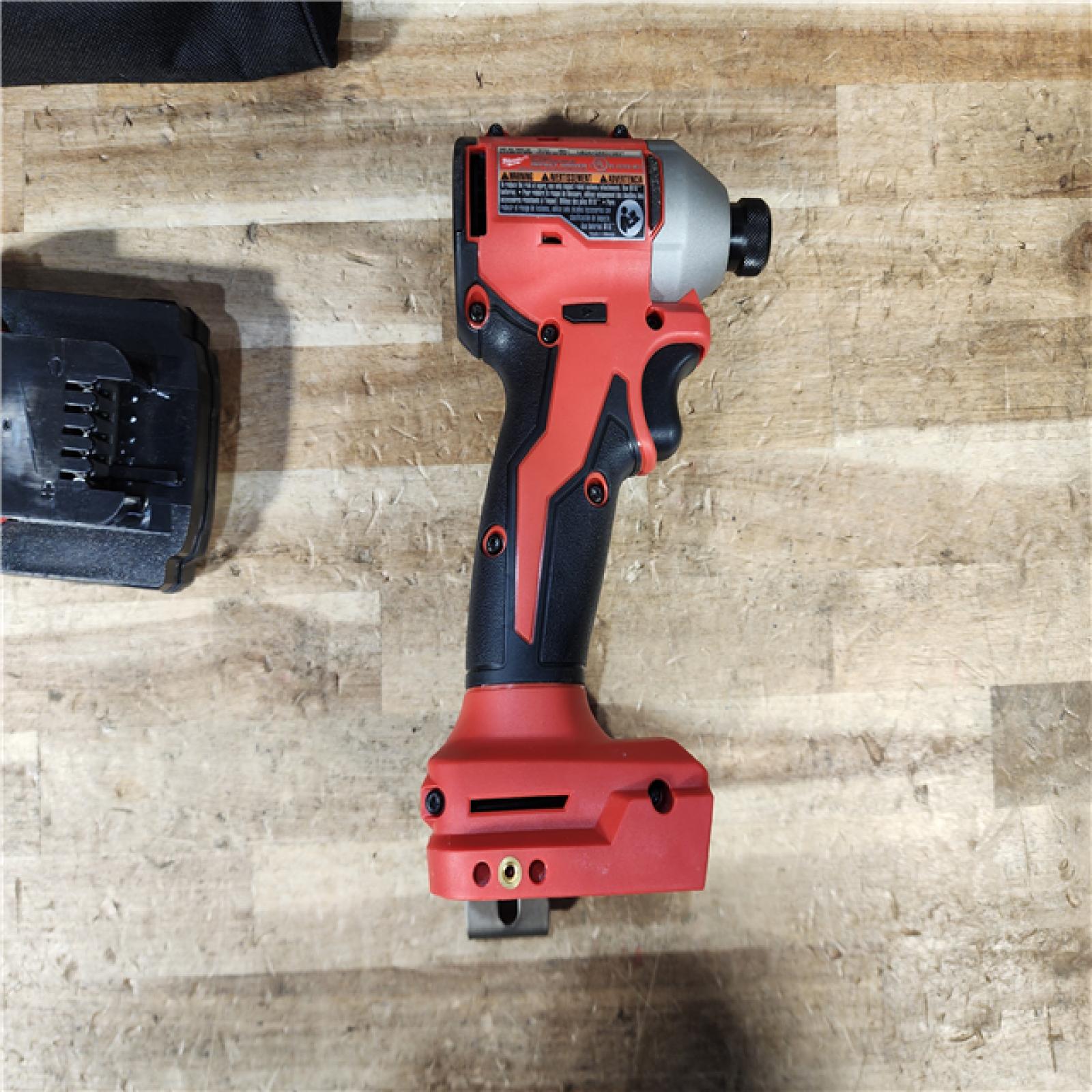 HOUSTON LOCATION - AS - IS Milwaukee 18-Volt Lithium-Ion Compact Brushless Cordless 1/4 in. Impact Driver Kit