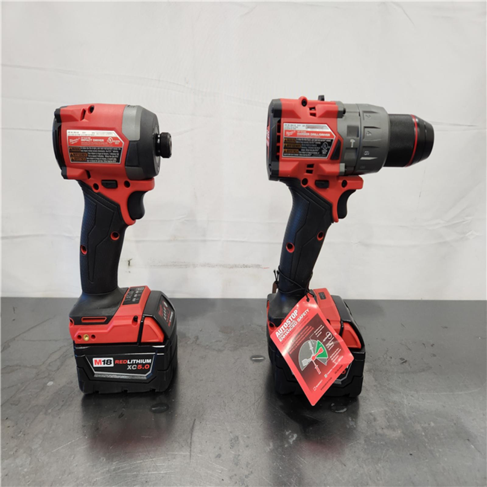 AS-IS- Milwaukee FUEL 18V Lithium-Ion Brushless Cordless Hammer Drill and Impact Driver Combo Kit
