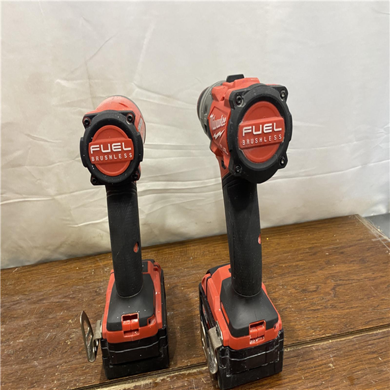 AS-IS MILWAUKEE M18 FUEL 18V Lithium-Ion Brushless Cordless Hammer Drill and Impact Driver Combo Kit (2-Tool) with 2 Batteries
