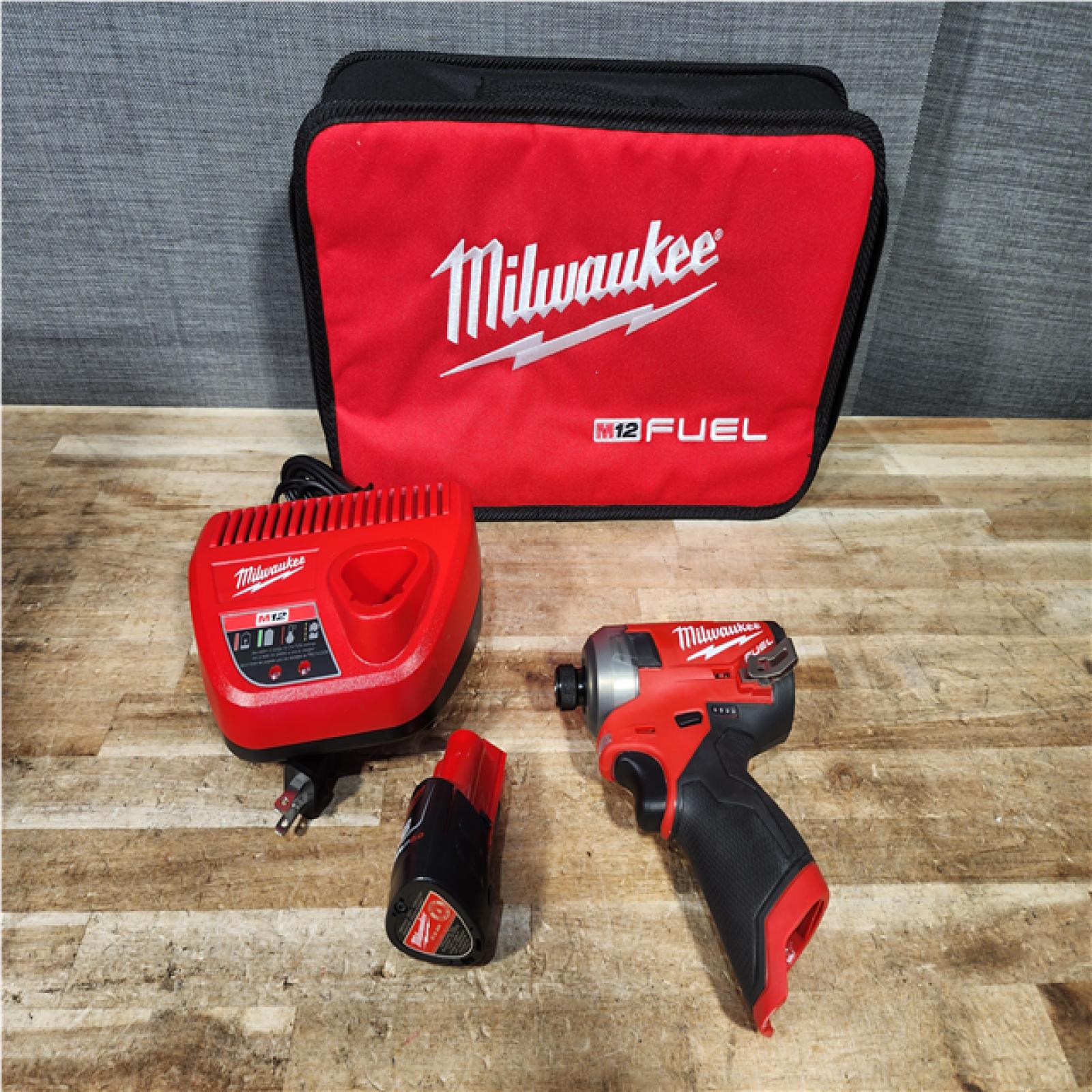 Houston Location AS-IS Milwaukee FUEL SURGE 12V Lithium-Ion Brushless Cordless 1/4 in. Hex Impact Driver Compact Kit