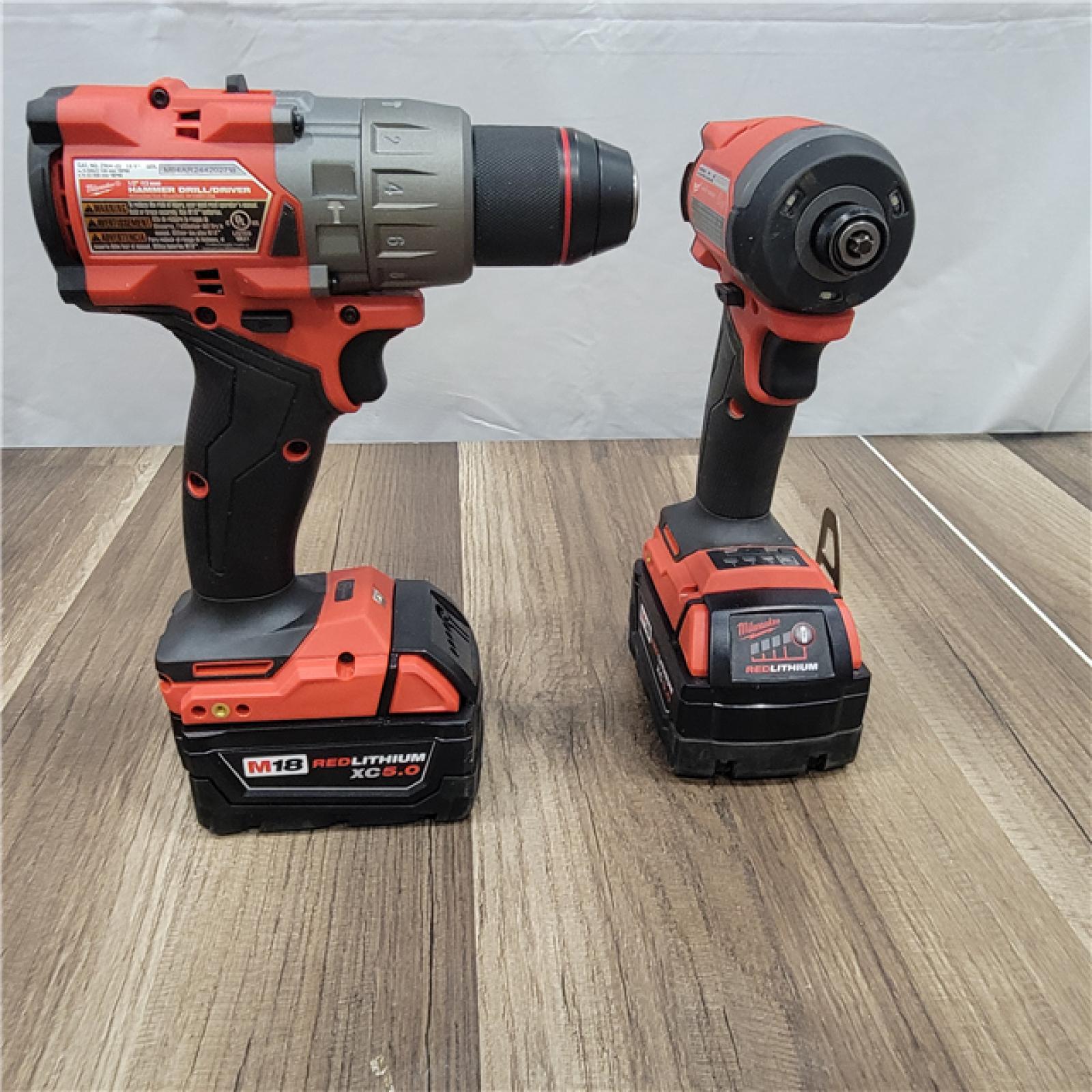 AS-IS Milwaukee M18 FUEL 18V Lithium-Ion Brushless Cordless Hammer Drill and Impact Driver Combo Kit (2-Tool) with 2 Batteries