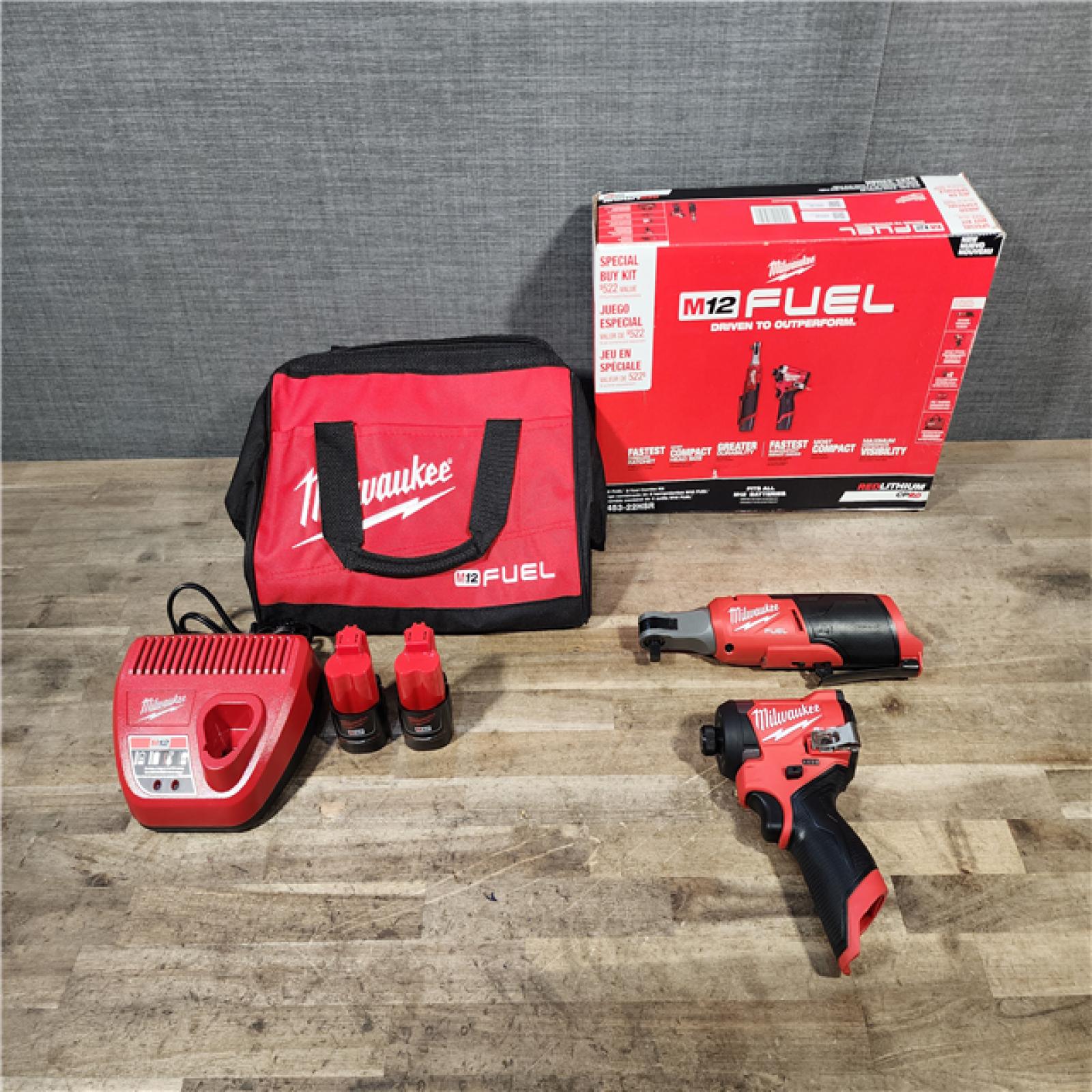 HOUSTON LOCATION - AS-IS (APPEARS LIKE NEW) Milwaukee 3453-22HSR M12 FUEL 12V Lithium-Ion Cordless 3/8 in. Ratchet and 1/4 in. Impact Driver Kit