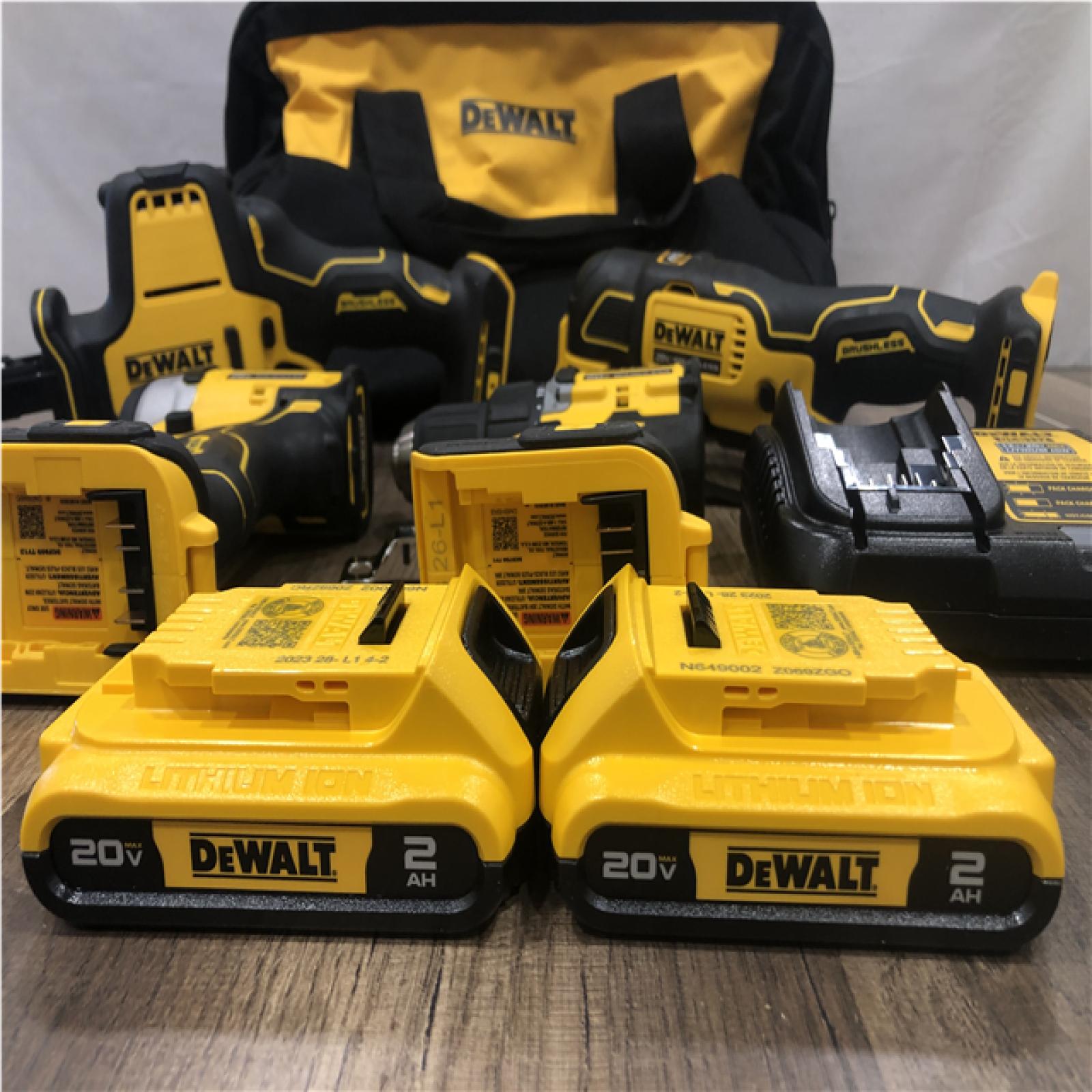 AS-IS DEWALT ATOMIC 20-Volt Lithium-Ion Cordless Brushless (4-Tool) Combo Kit