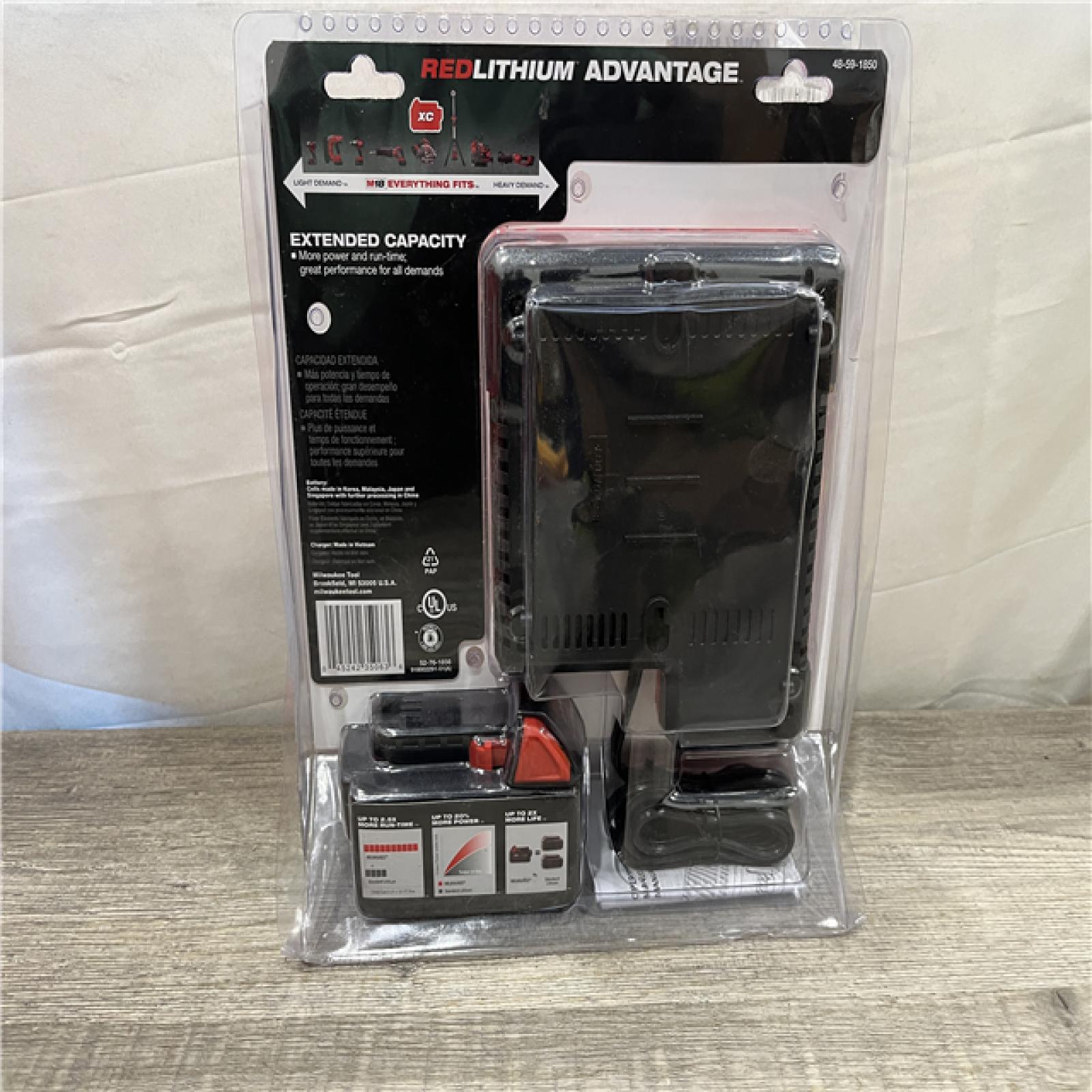 NEW - Milwaukee 18-Volt Lithium-Ion XC Starter Kit with (1) 5.0Ah Battery and Charger