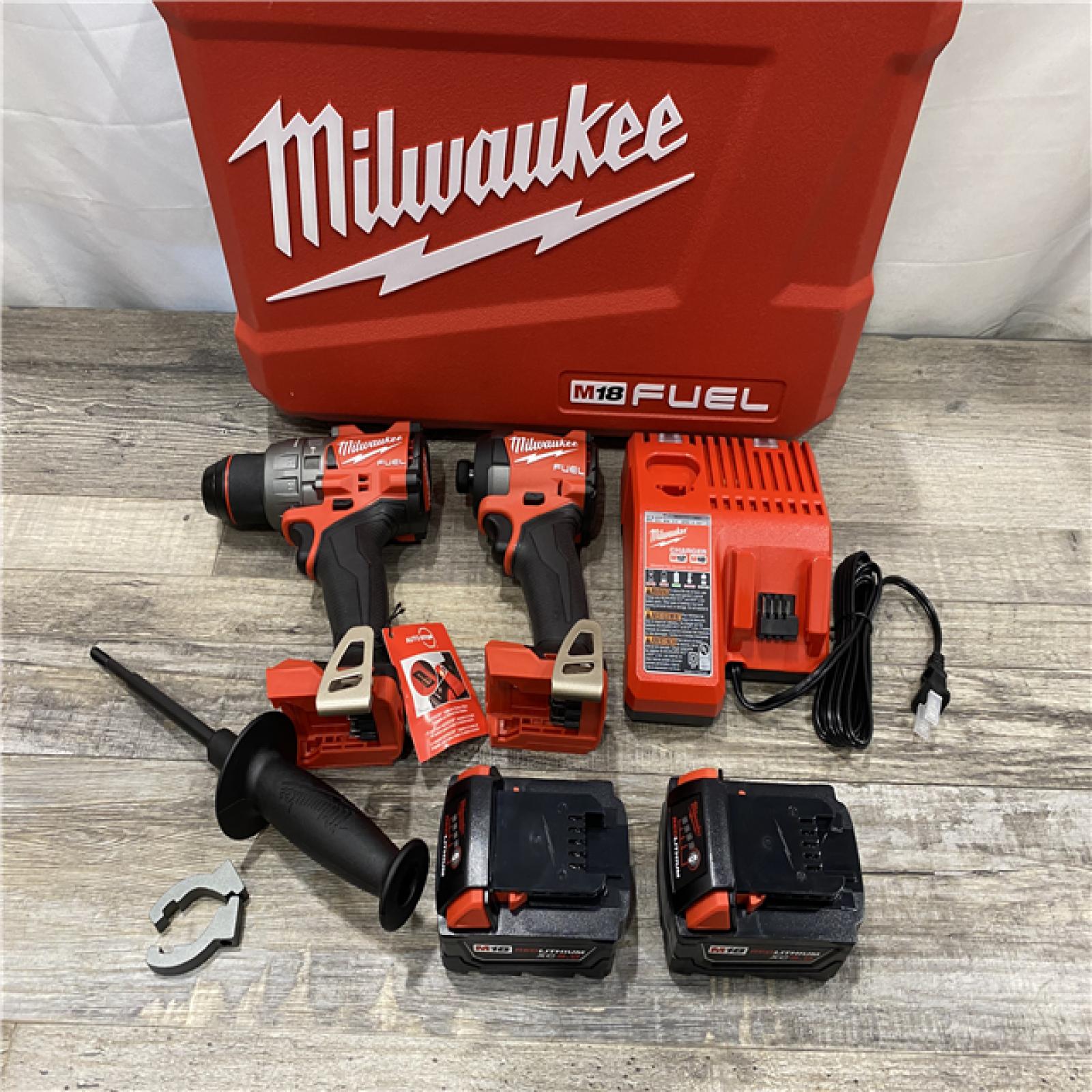 LIKE NEW - Milwaukee FUEL 18V Lithium-Ion Brushless Cordless Hammer Drill and Impact Driver Combo Kit