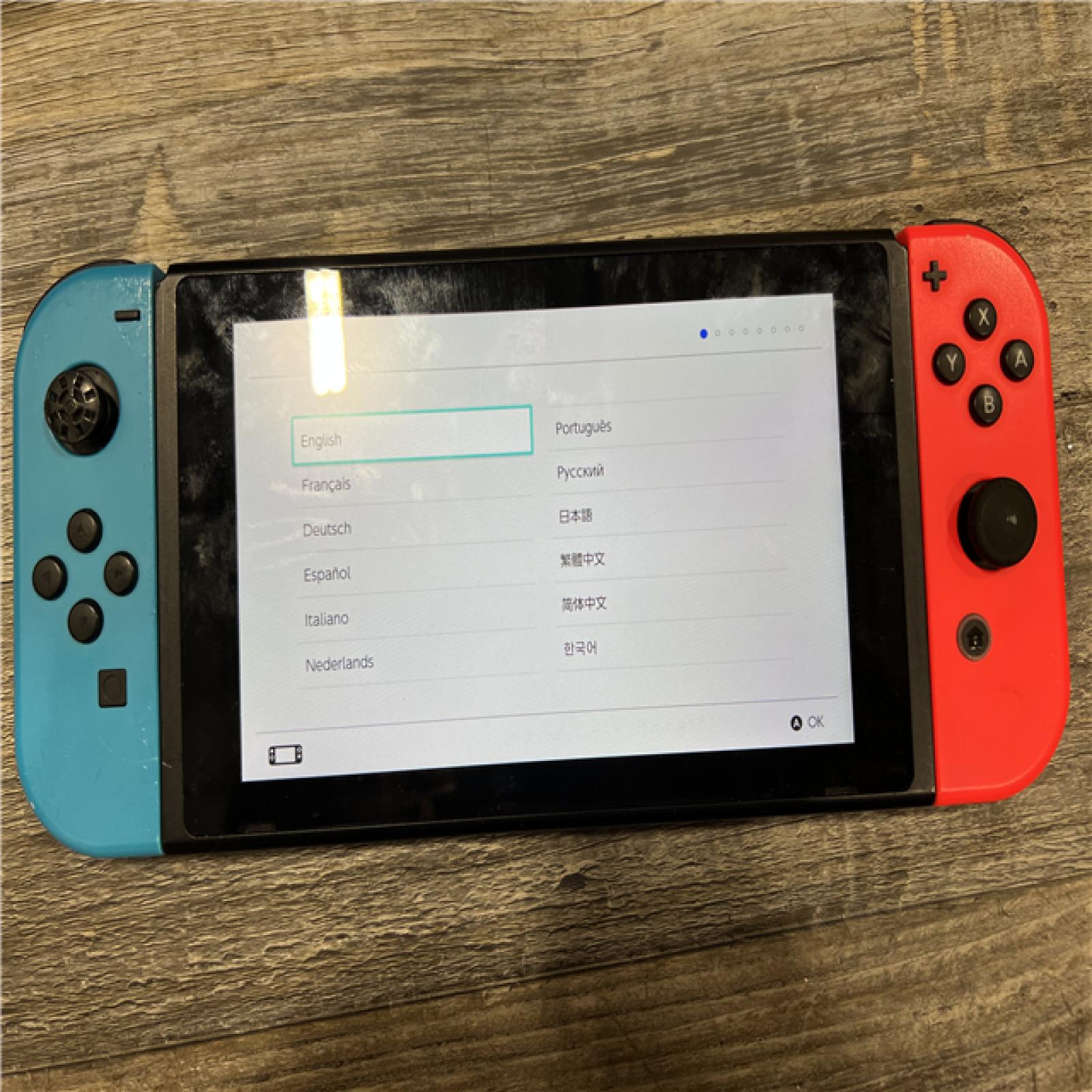 AS-IS Nintendo Switch with Neon Blue and Neon Red Joy-Con