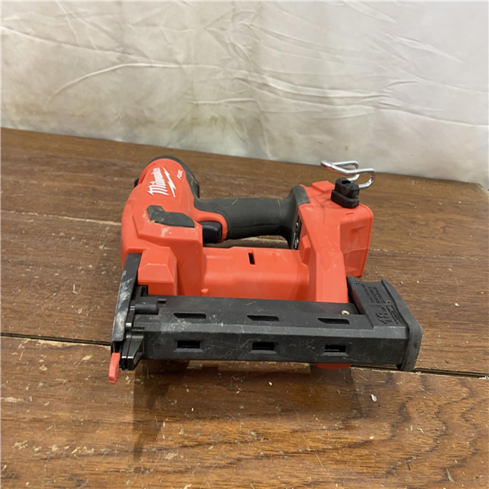 AS-IS MILWAUKEE FUEL 18-Volt Lithium-Ion Brushless Cordless 18-Gauge 1/4 in. Narrow Crown Stapler (Tool-Only)