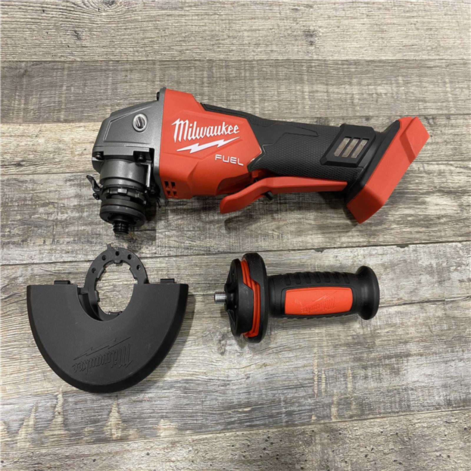 AS-IS Milwaukee FUEL 18V Lithium-Ion Brushless Cordless 4-1/2 in./5 in. Grinder with Variable Speed & Paddle Switch (Tool-Only)