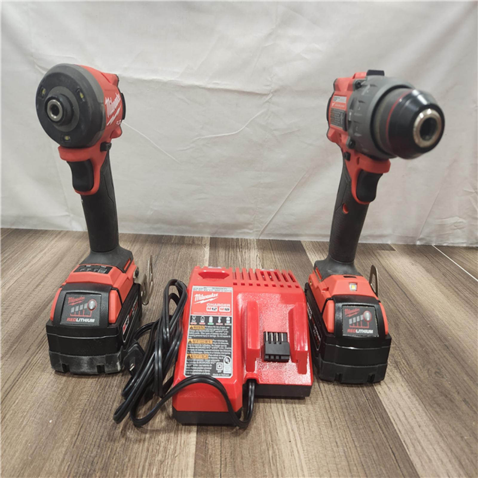 AS-IS- MILWAUKEE FUEL 18V Lithium-Ion Brushless Cordless Hammer Drill and Impact Driver Combo Kit
