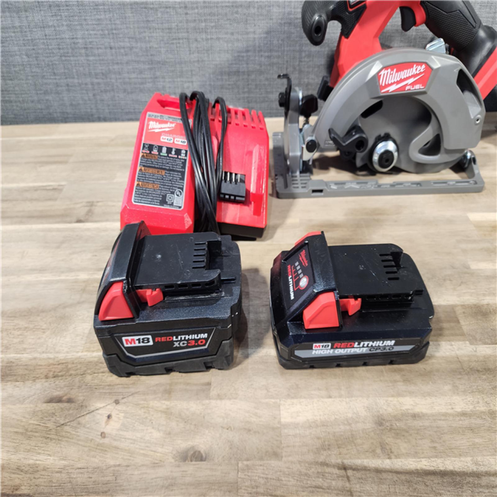 HOUSTON LOCATION - AS-IS MILWAUKEE 3 TOOL COMBO KIT W/ (2) BATTERY & CHARGER